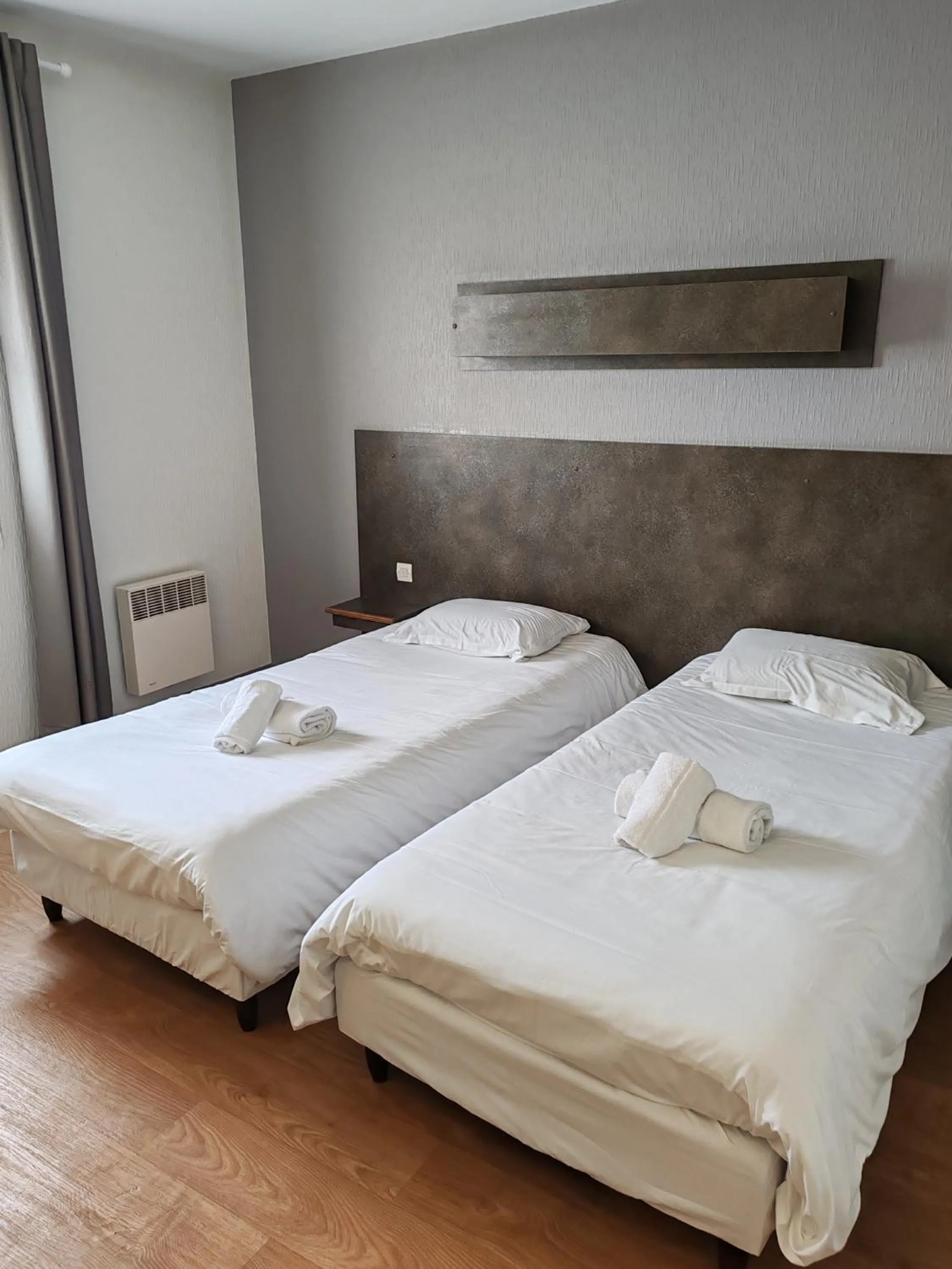 Bed in Hotel Marjolaine