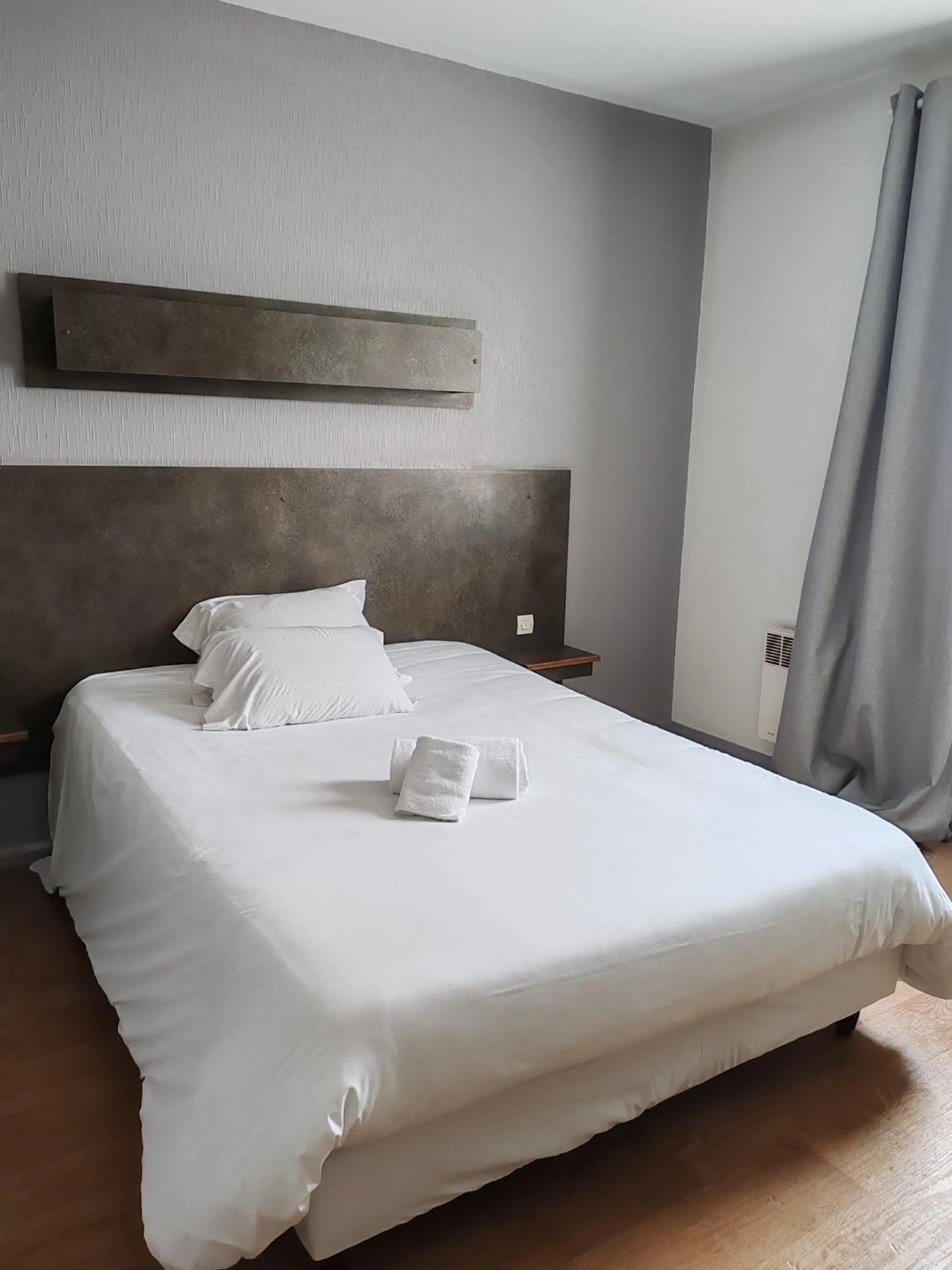 Bed in Hotel Marjolaine