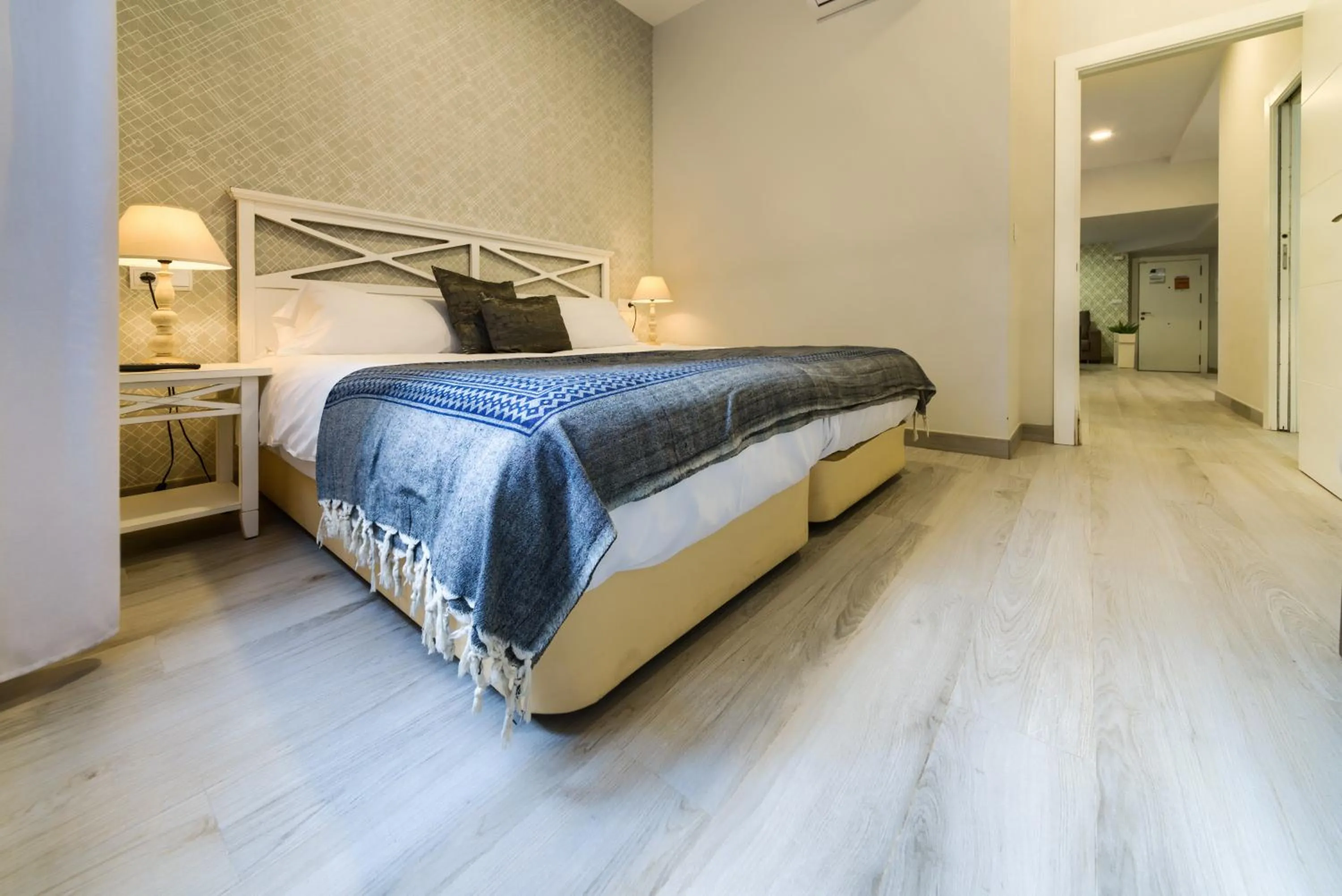 Bed in Holidays2Malaga Suites