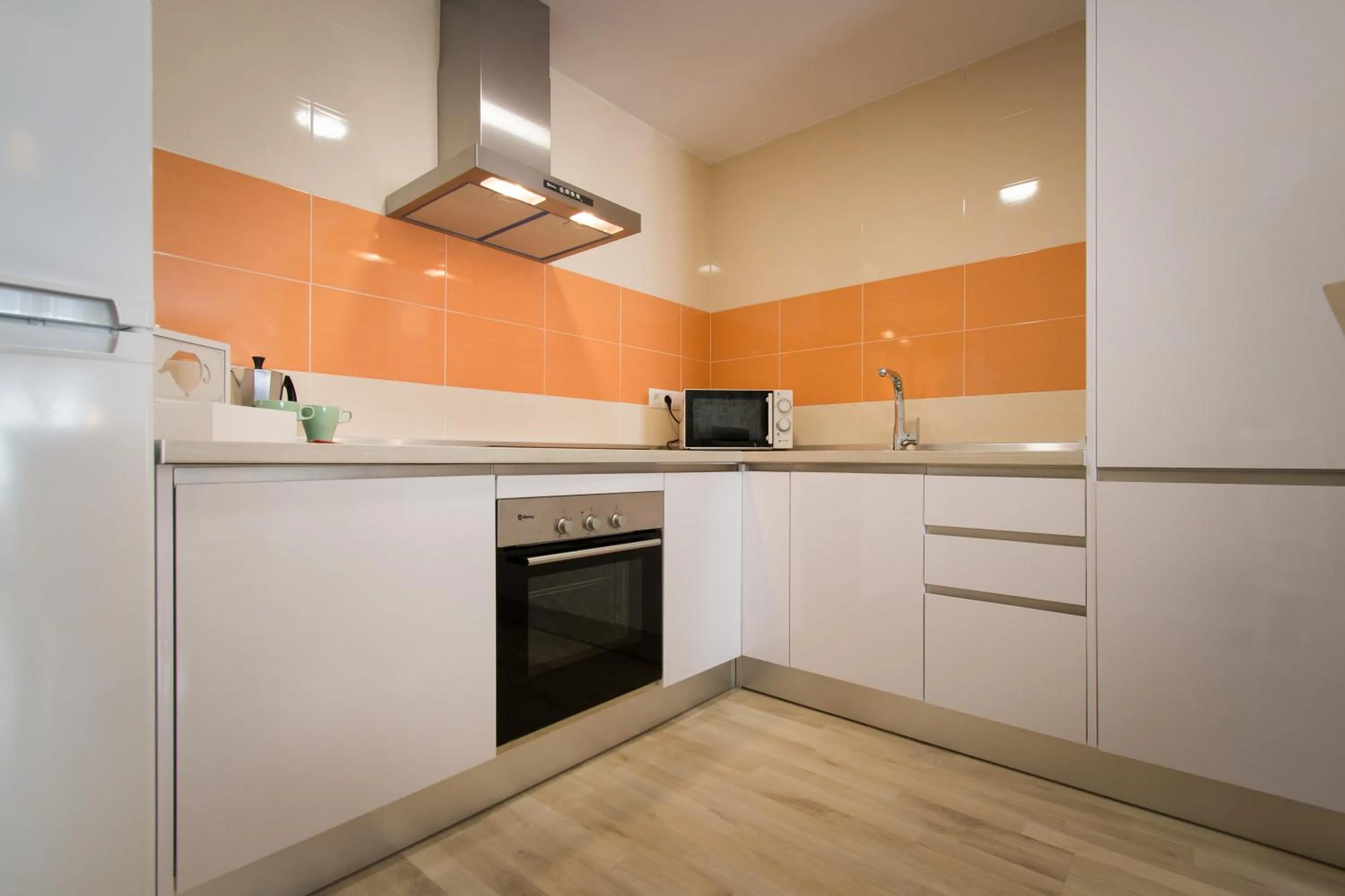 Kitchen or kitchenette in Holidays2Malaga Suites