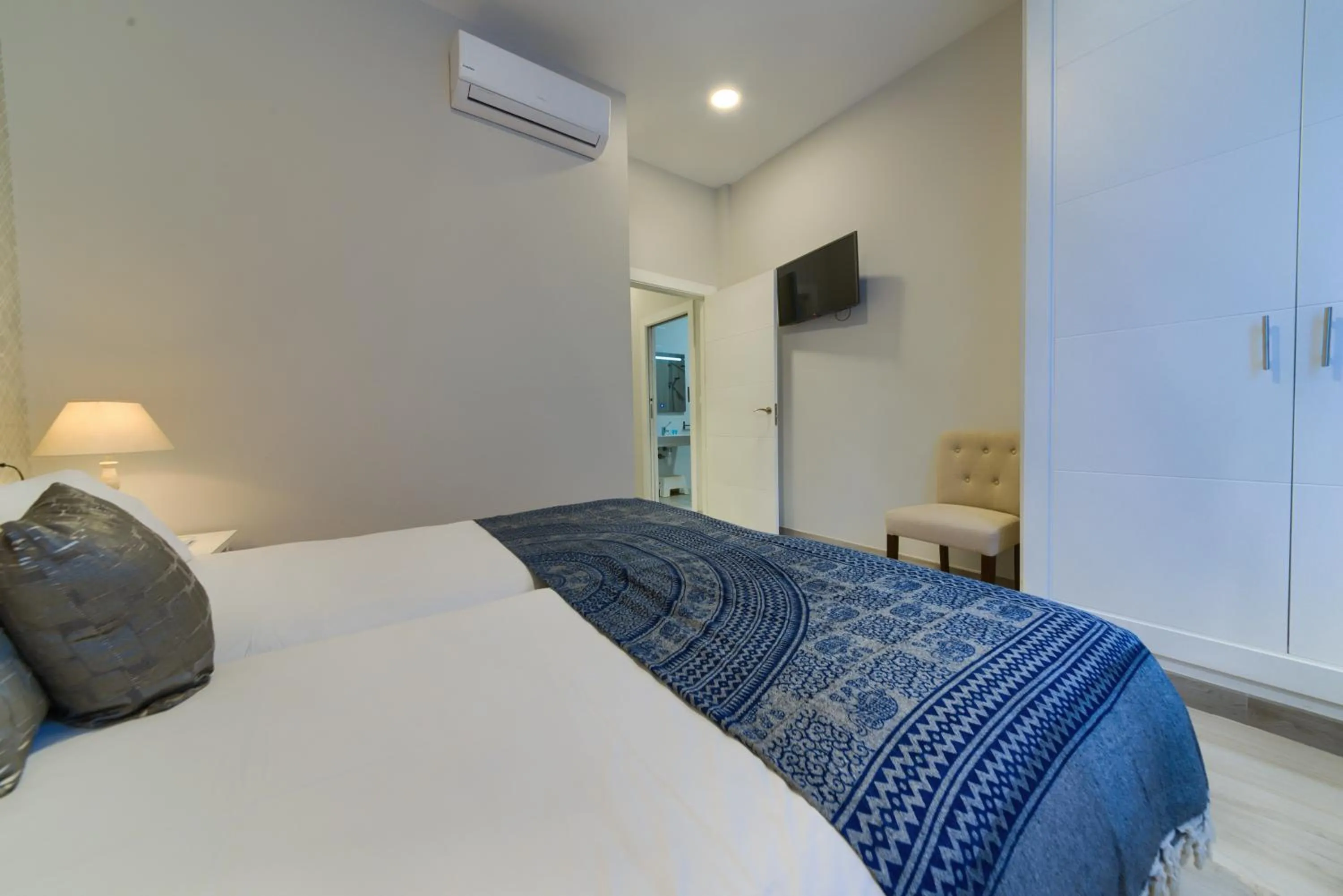 Bed in Holidays2Malaga Suites