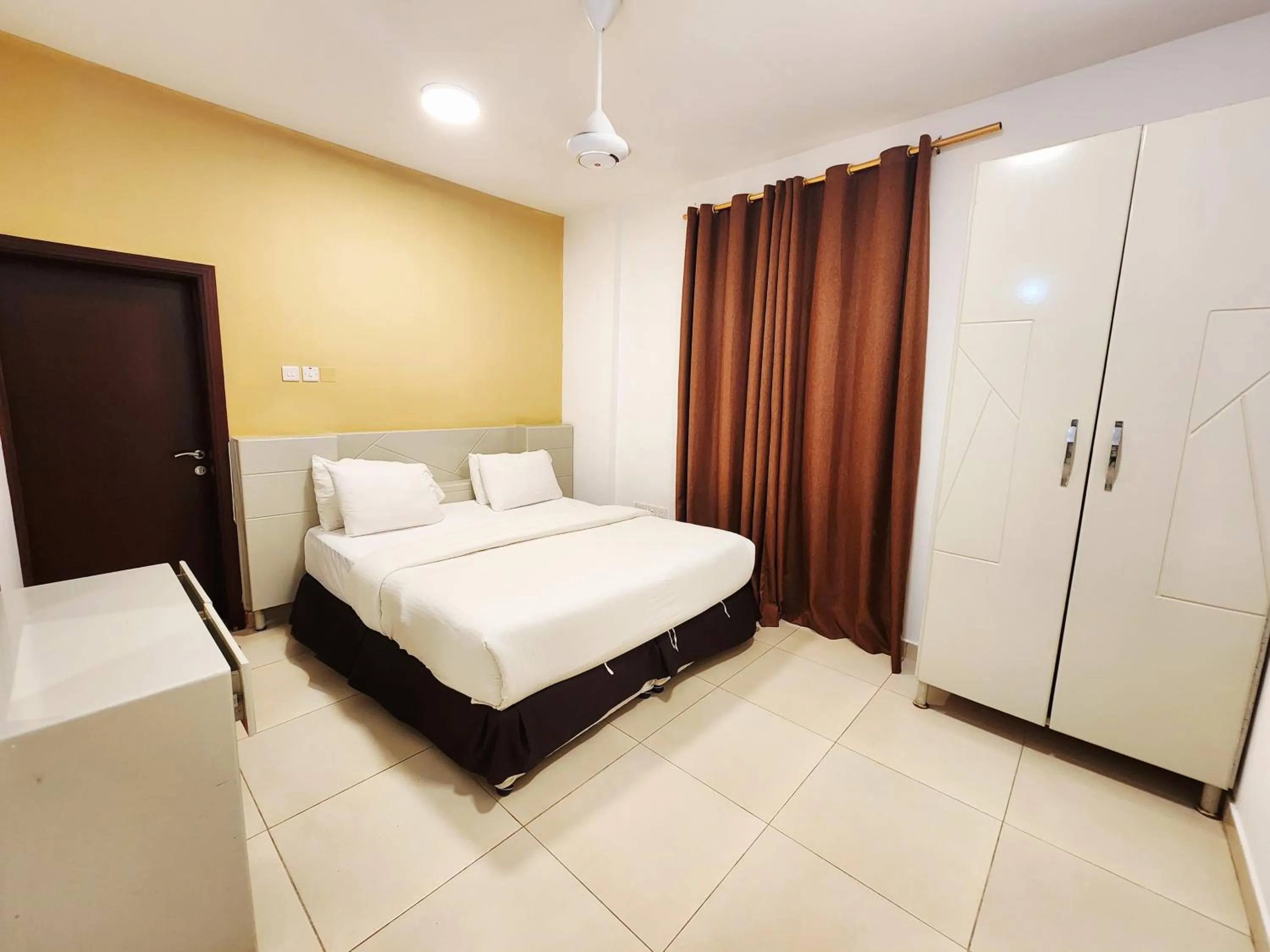 Bed in Star Emirates Inn Hotel Salalah