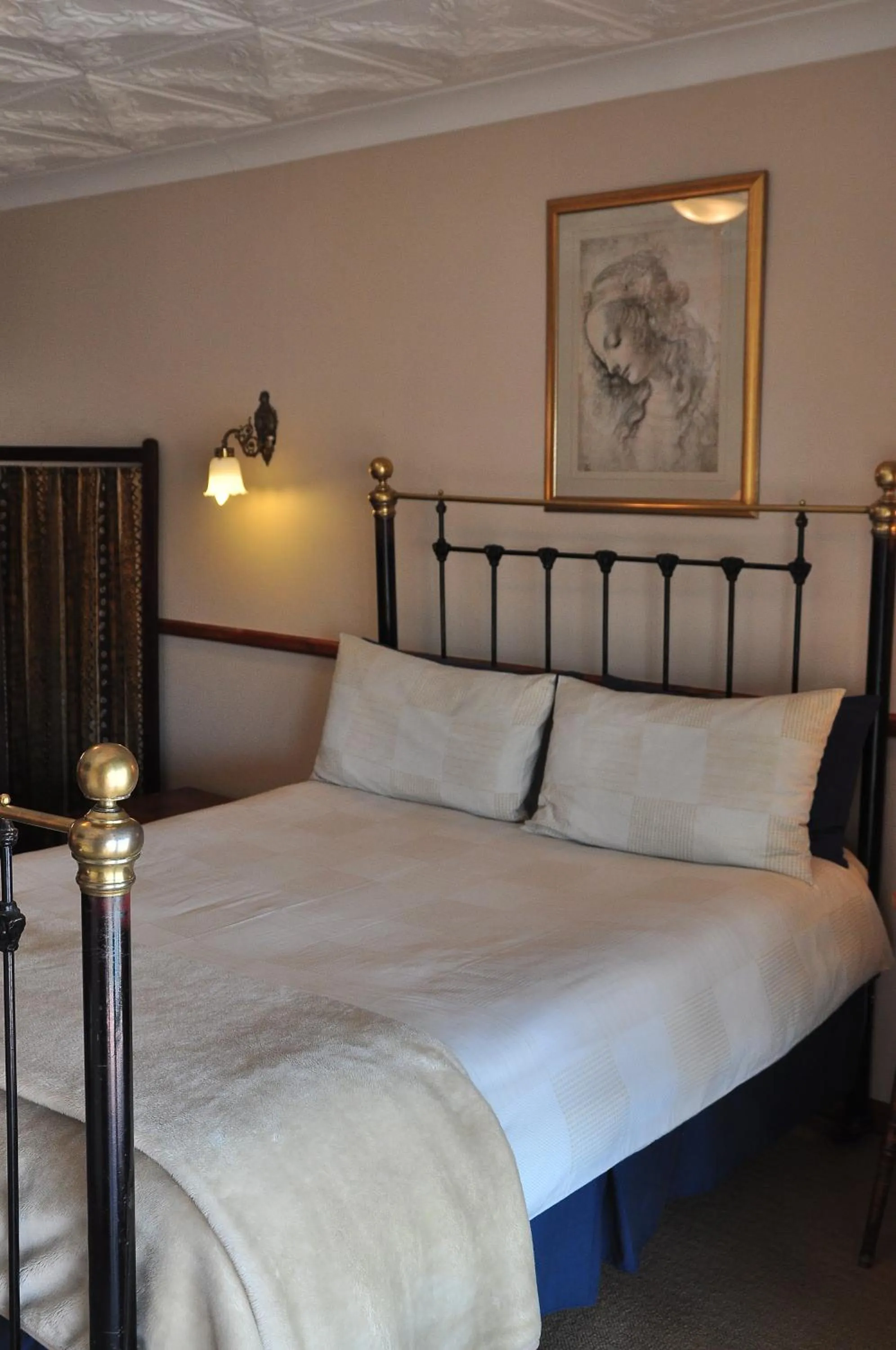 Bed in Agterplaas Guesthouse Pty Ltd