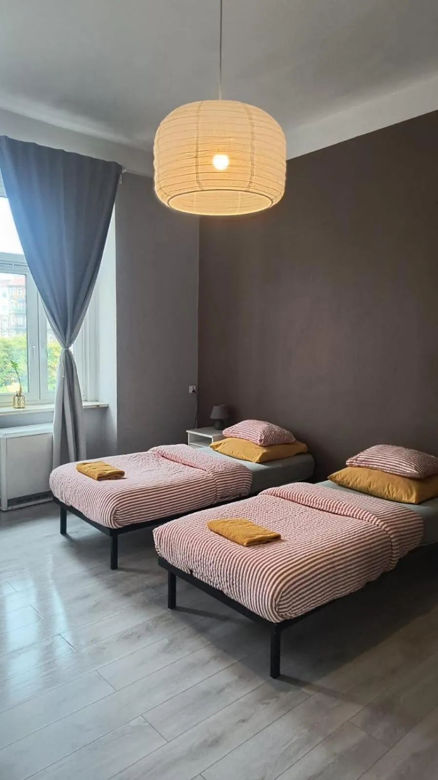 Bed in Colourful Rooms Wrocław