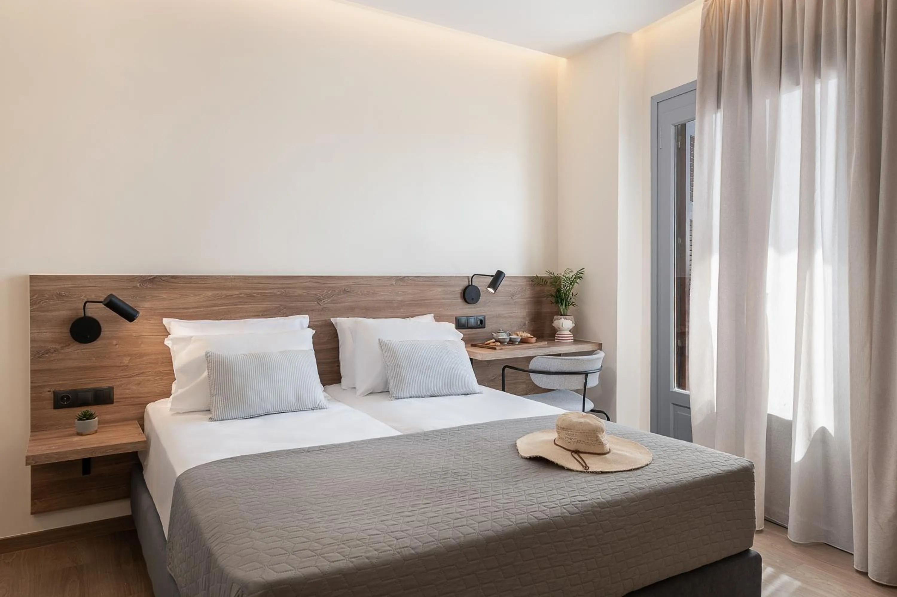 Bed in Amphitrite Hotel