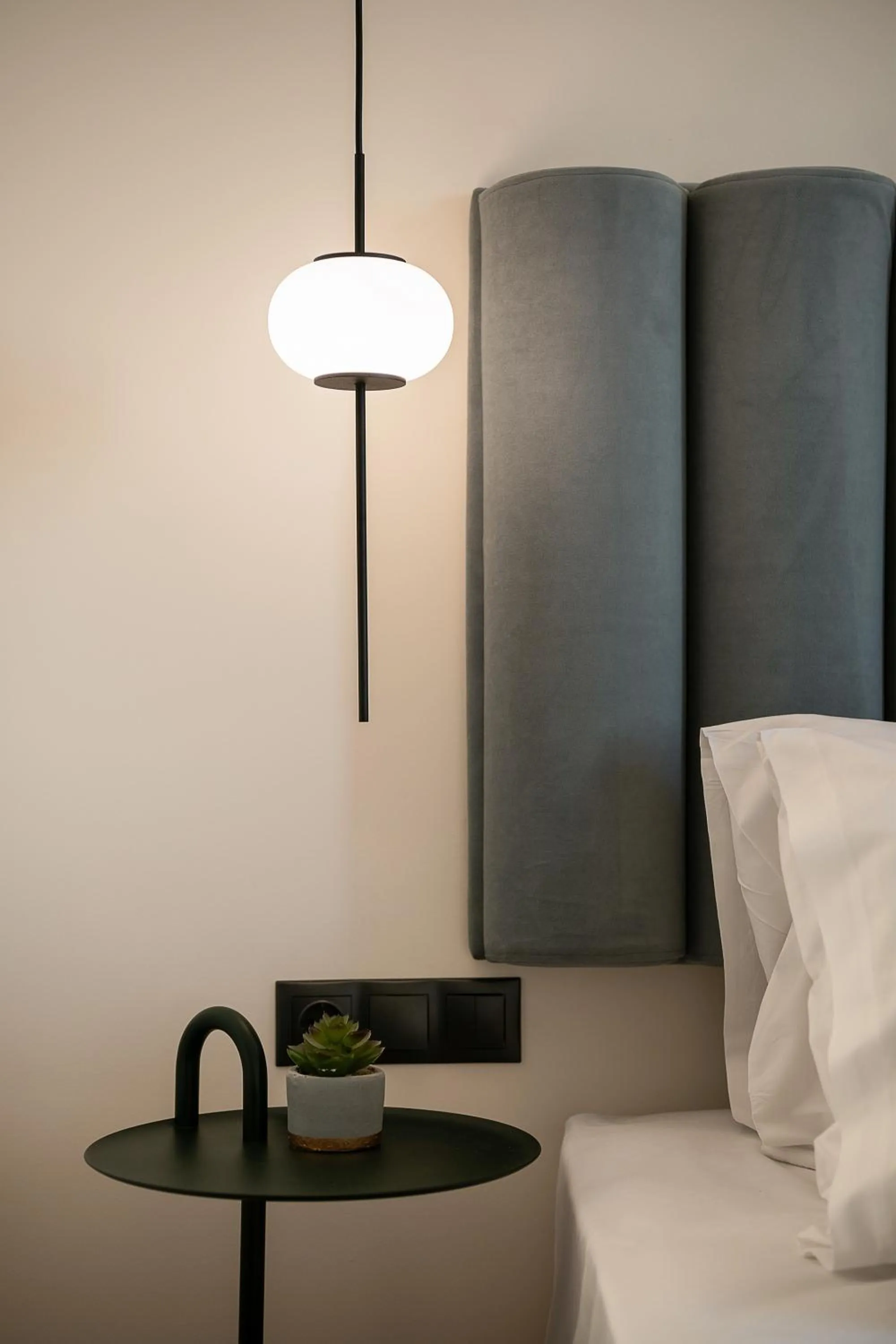 Bed in Amphitrite Hotel