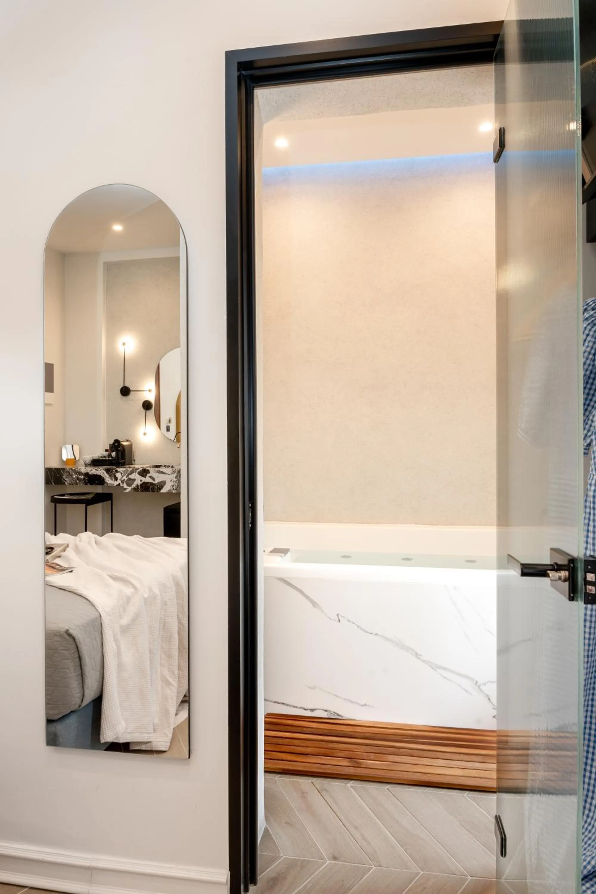 Bed in Amphitrite Hotel