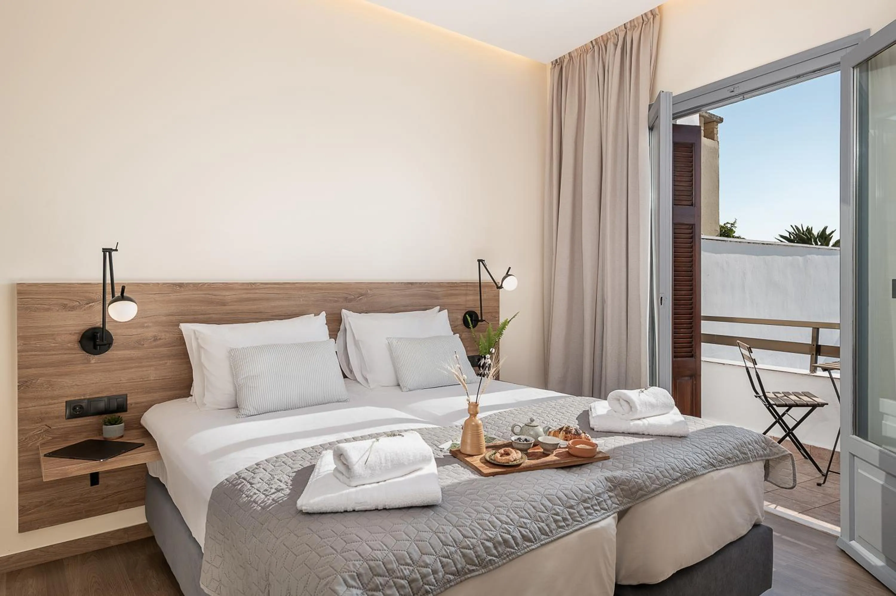 Bed in Amphitrite Hotel