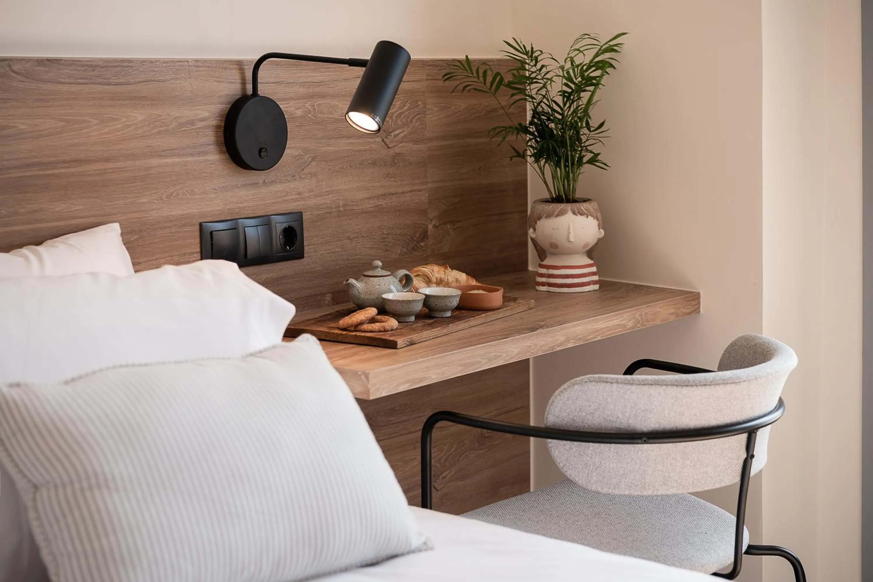 Seating area, Bed in Amphitrite Hotel