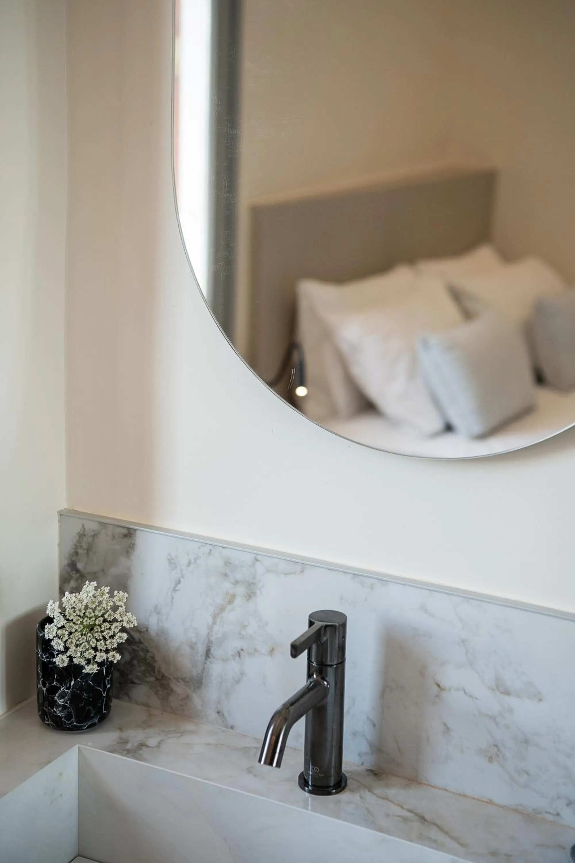 Bed in Amphitrite Hotel