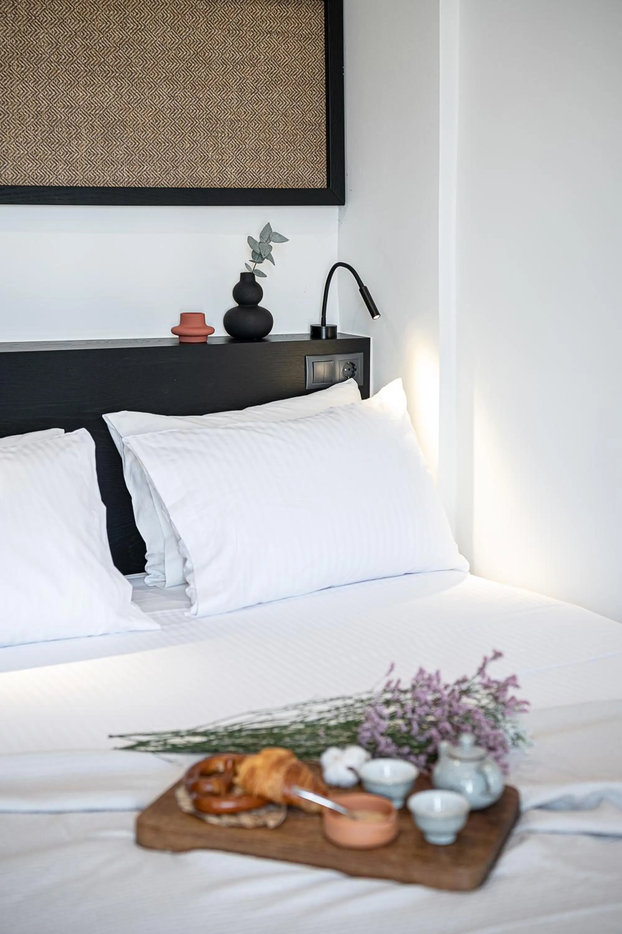 Bed in Amphitrite Hotel