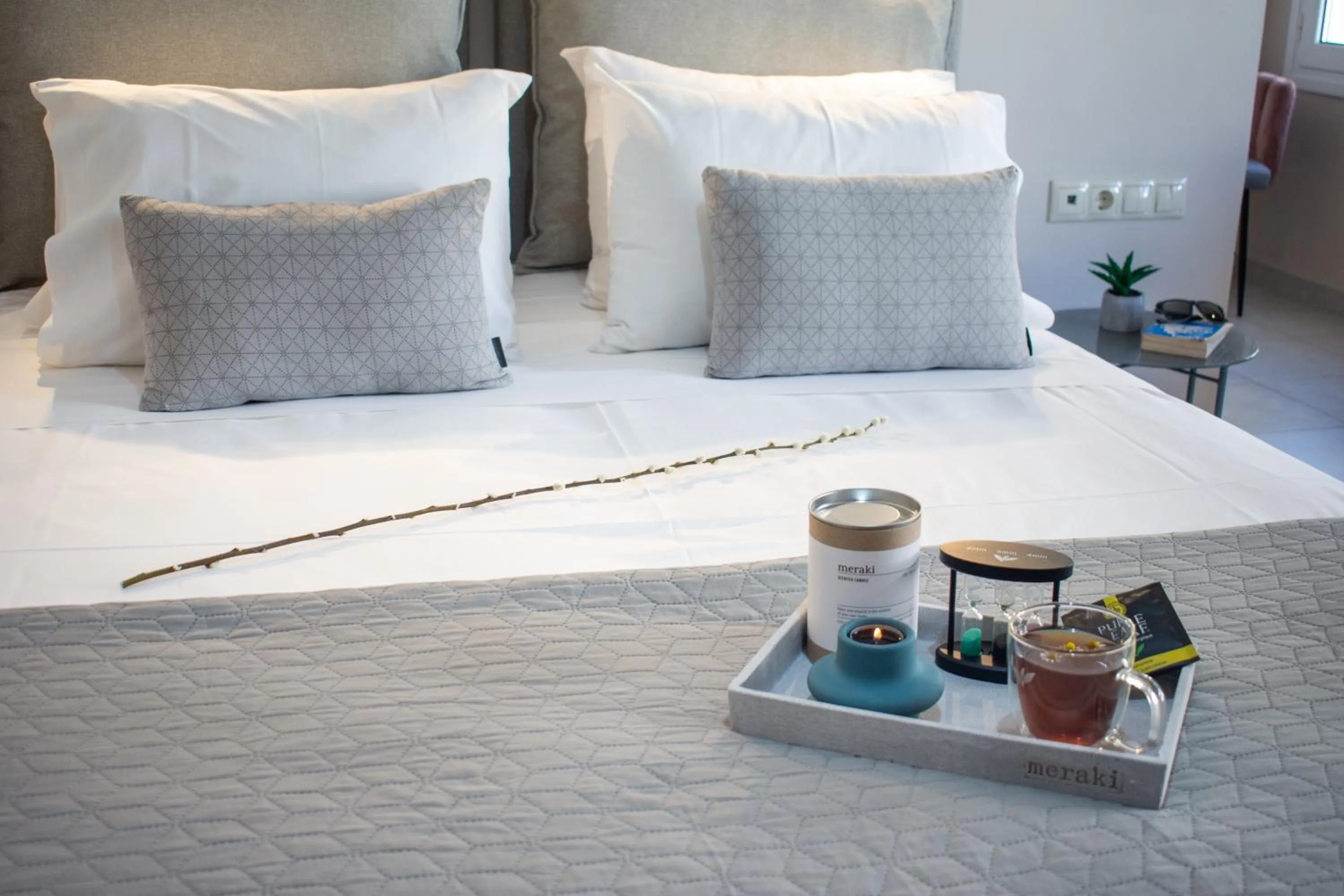 Bed in Amphitrite Hotel