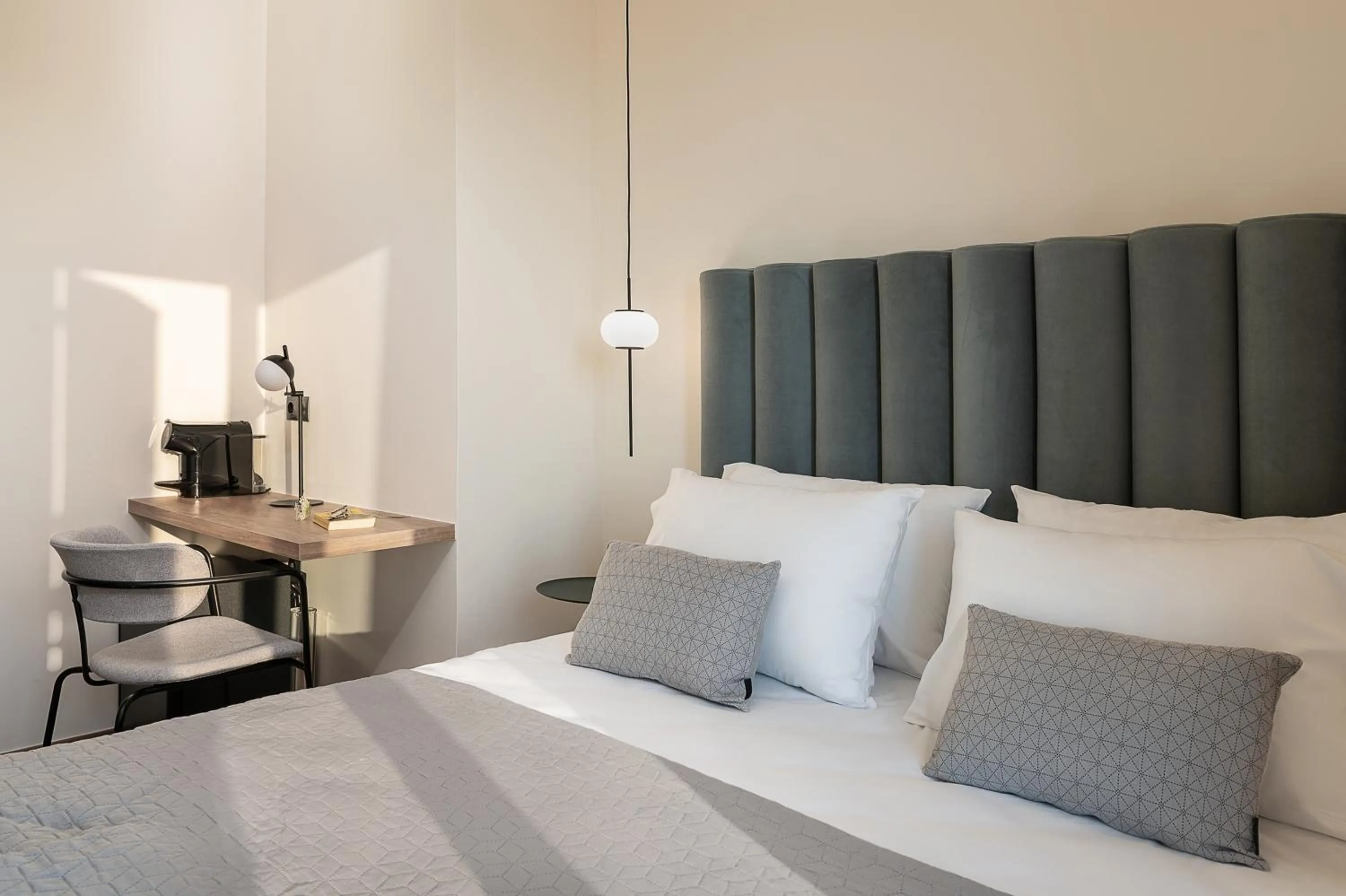 Bed in Amphitrite Hotel