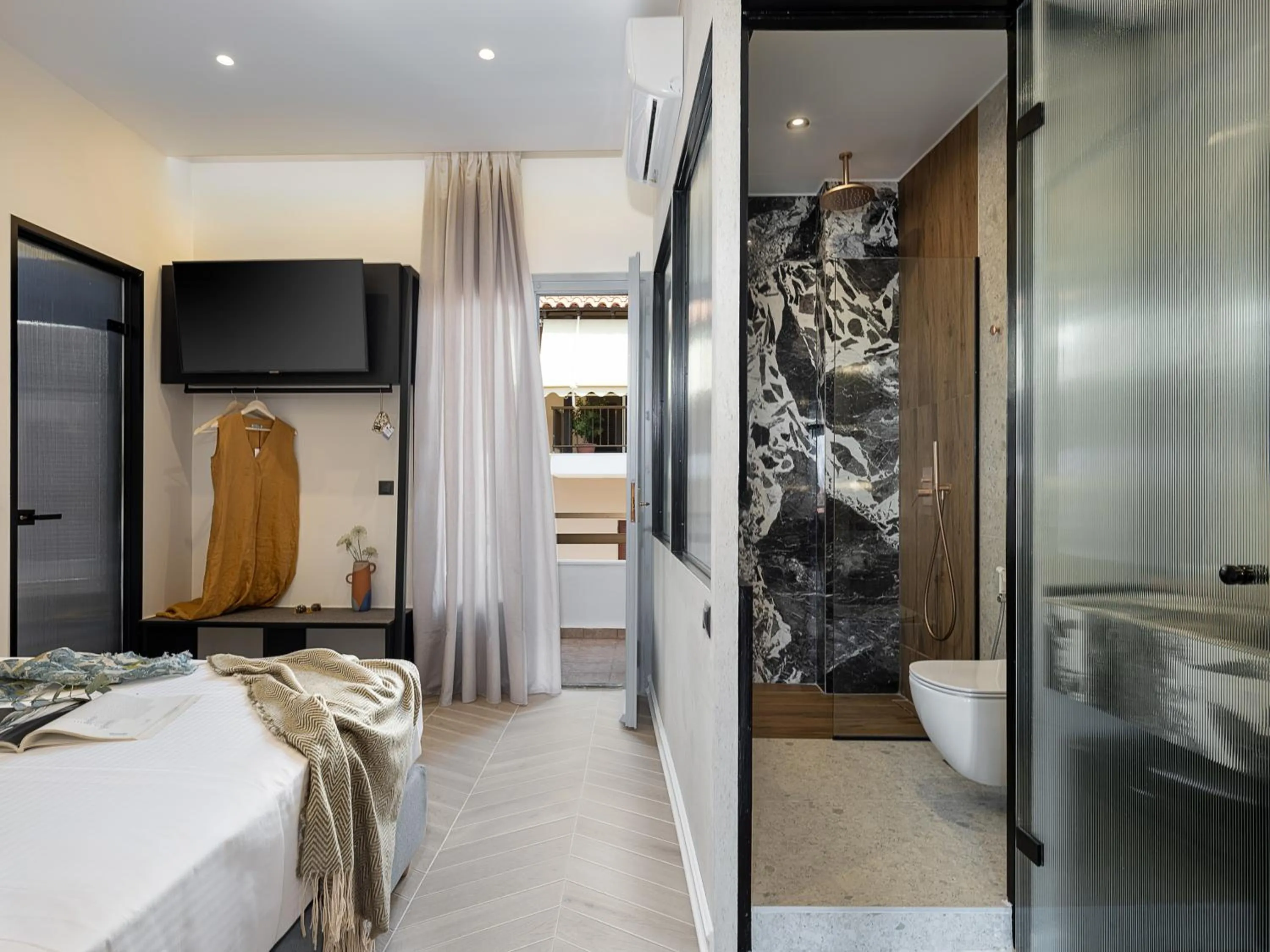 Bed in Amphitrite Hotel