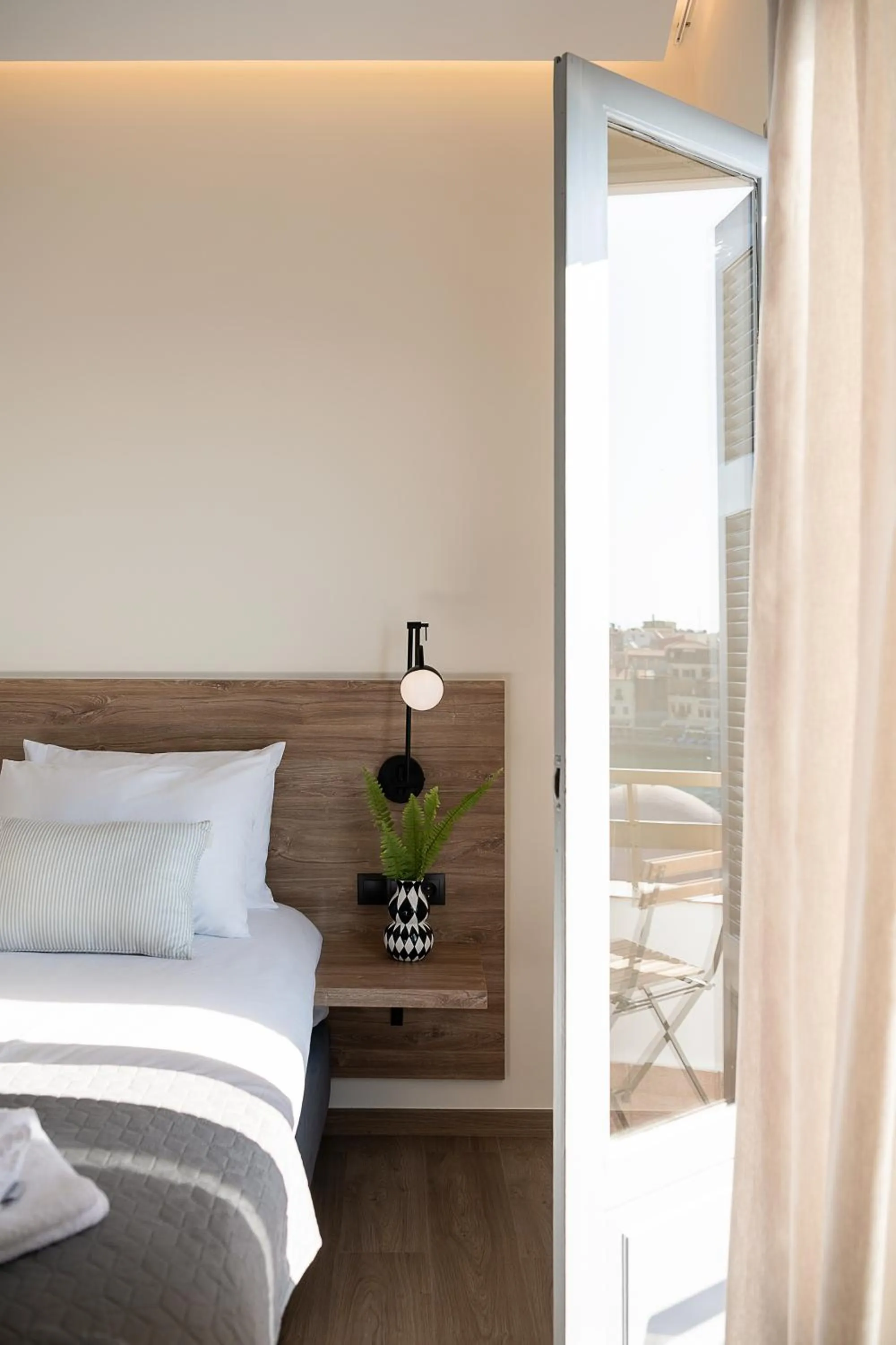 Bed in Amphitrite Hotel