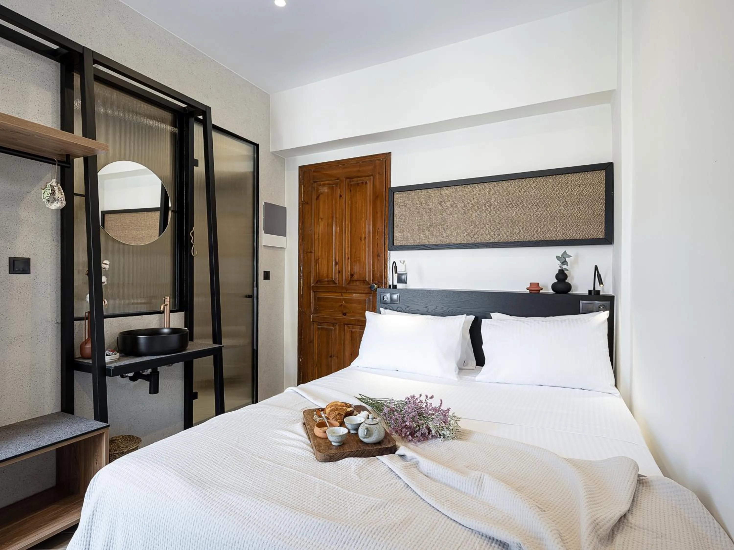 Bed in Amphitrite Hotel