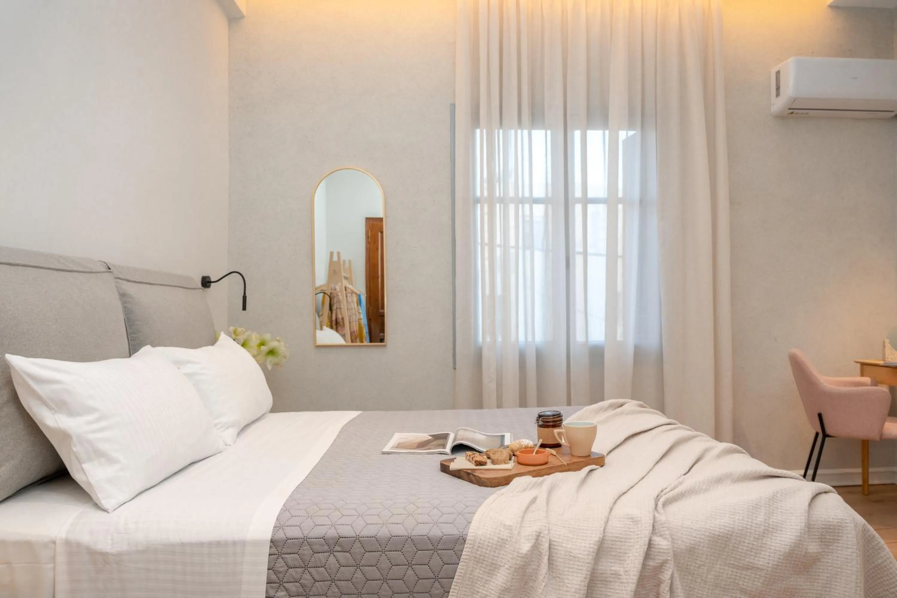 Bed in Amphitrite Hotel