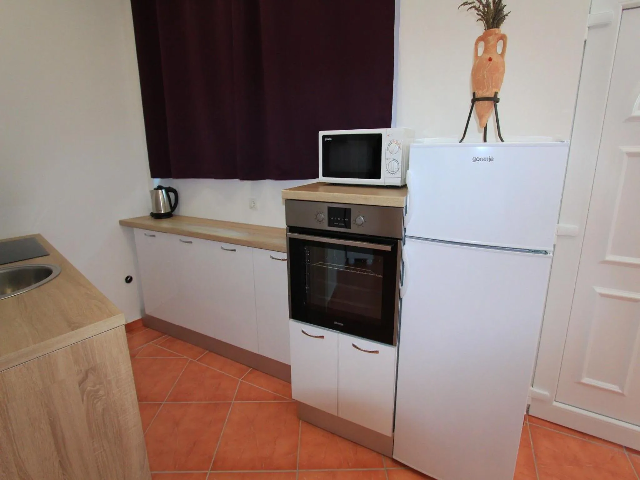 Kitchen or kitchenette in Apartments Nero