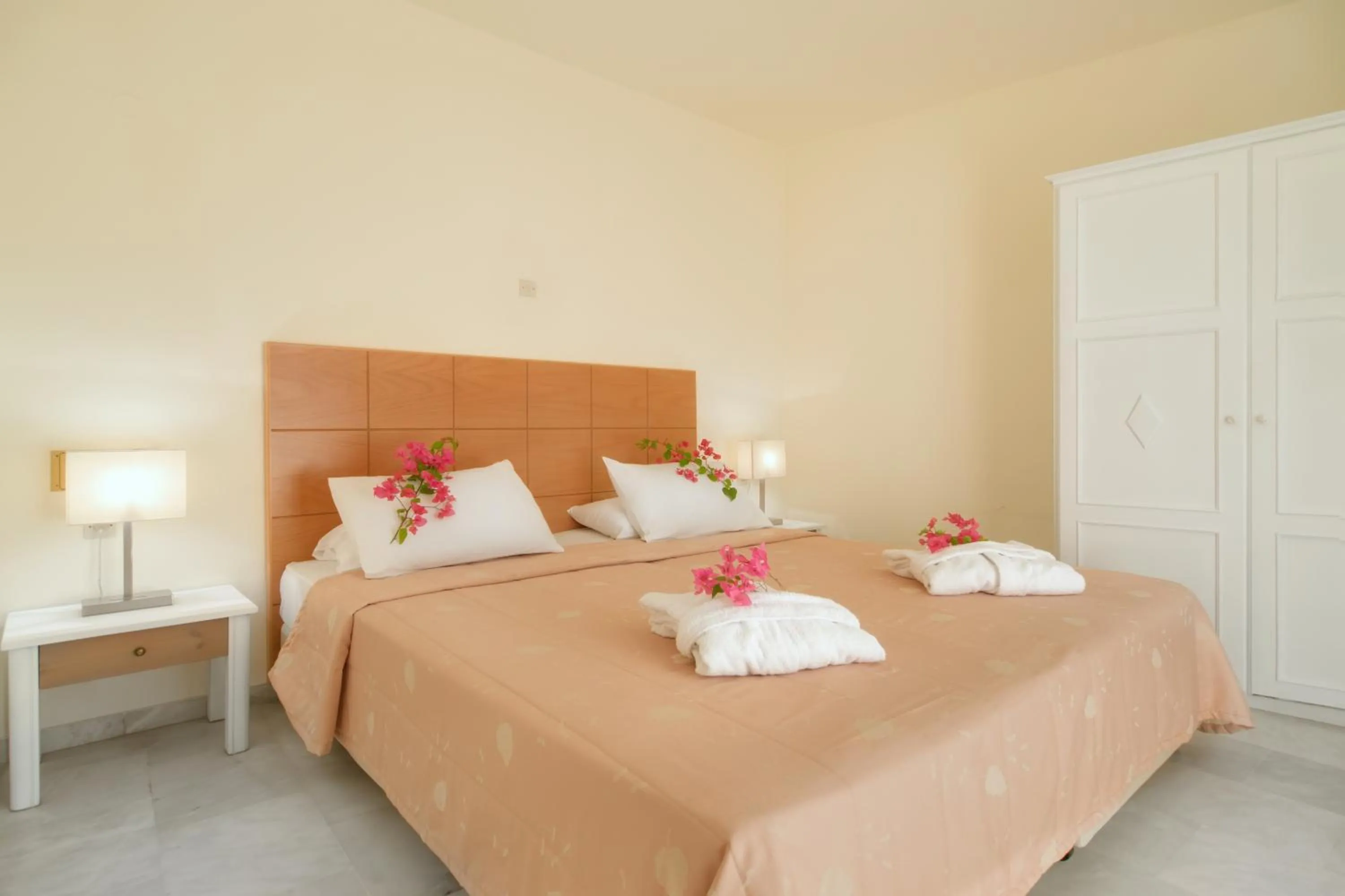 Bed in Mare Hotel Apartments