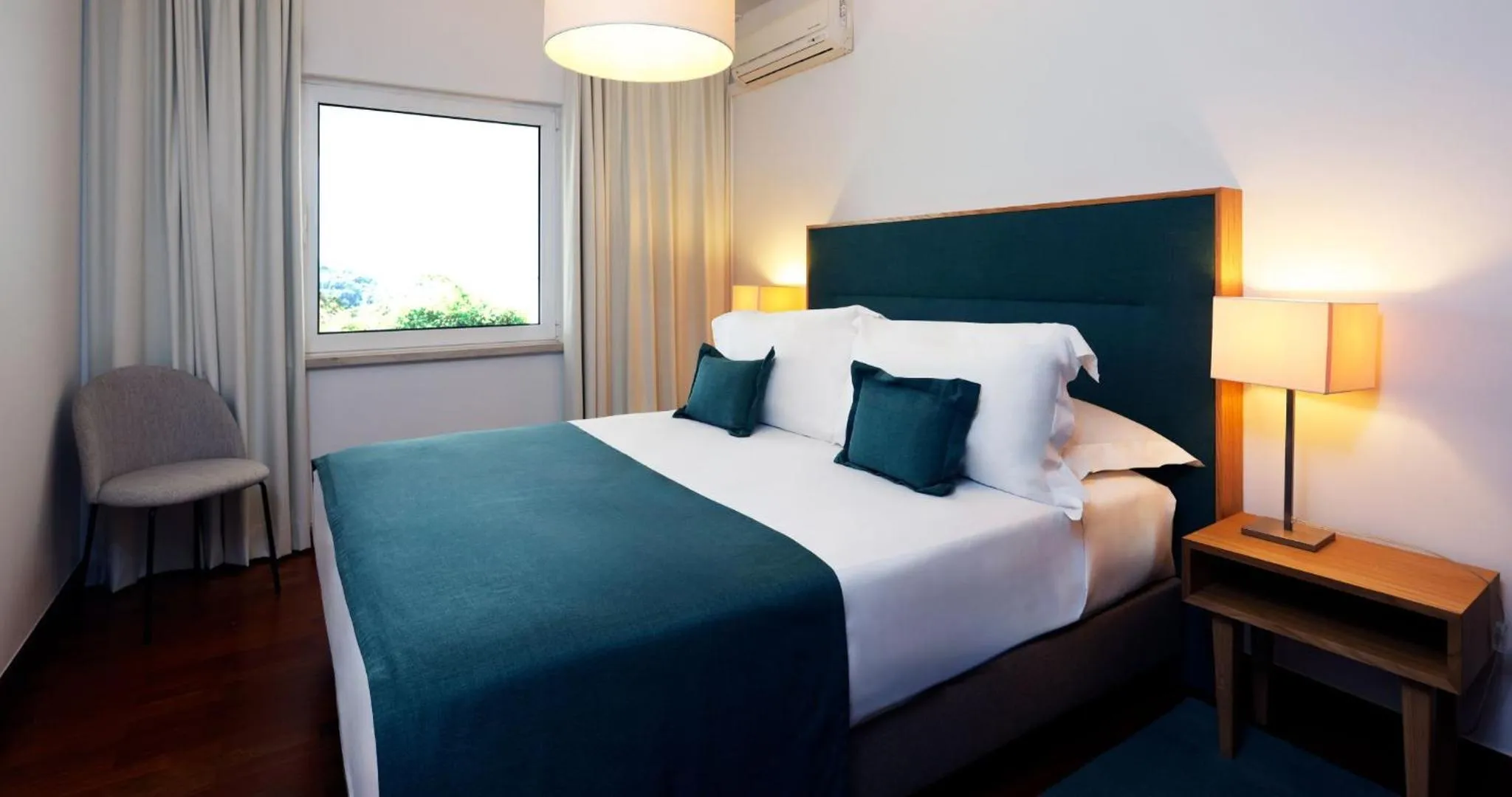 Bed in Montebelo Aguieira Lake Resort & Spa