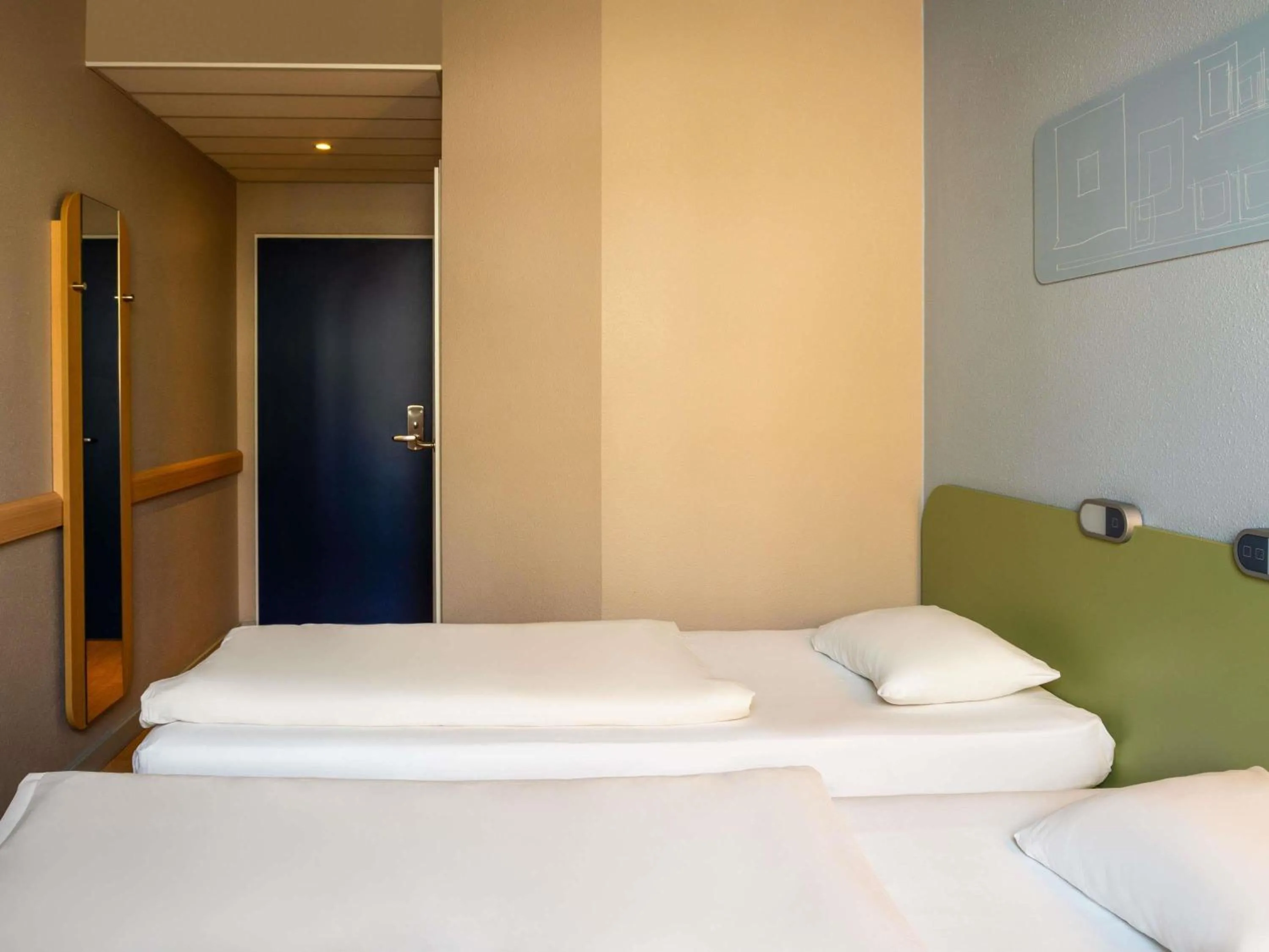 Bedroom, Bed in ibis budget Muenchen Ost Messe