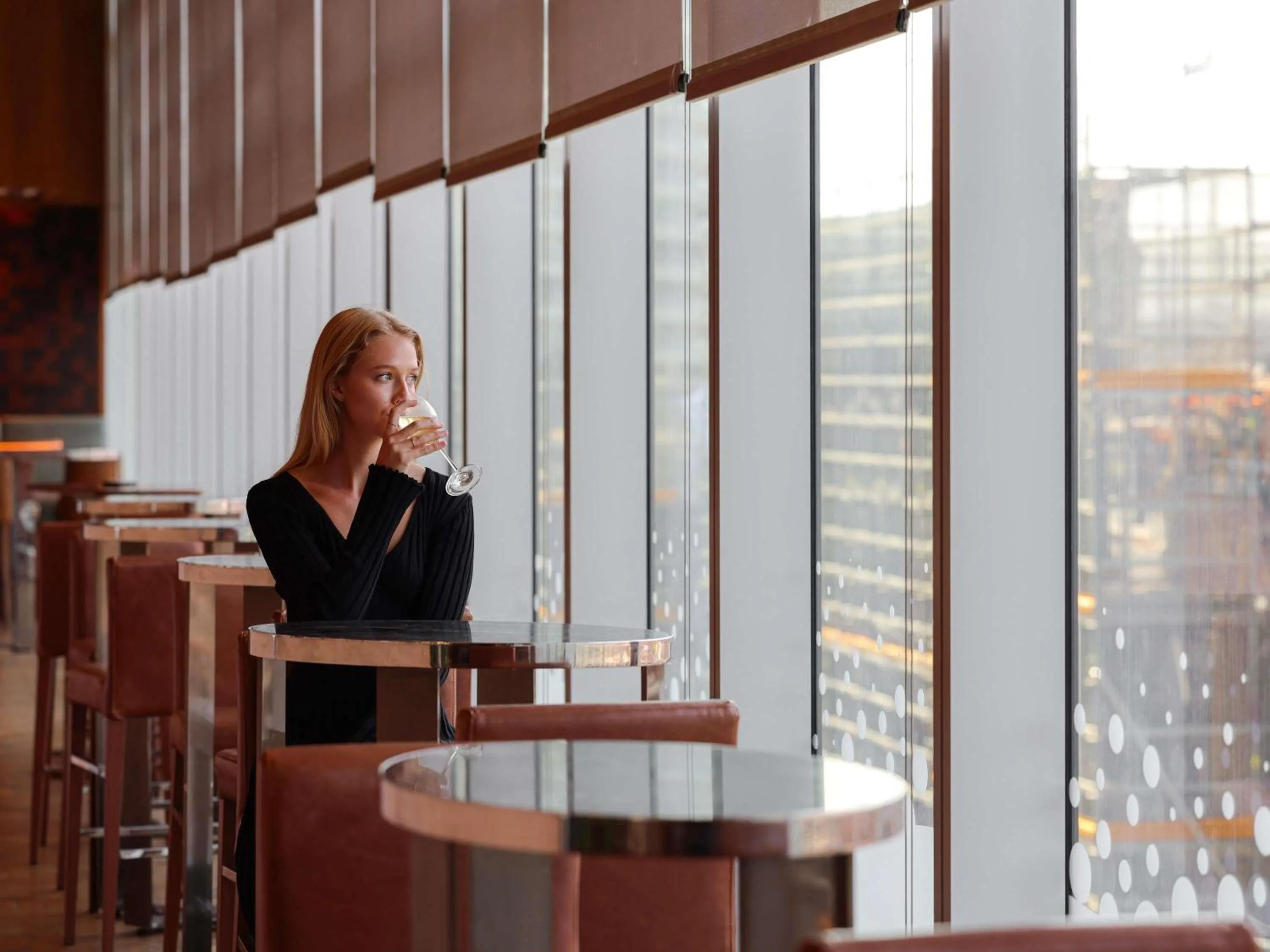 Lounge or bar in Sofitel Sydney Darling Harbour