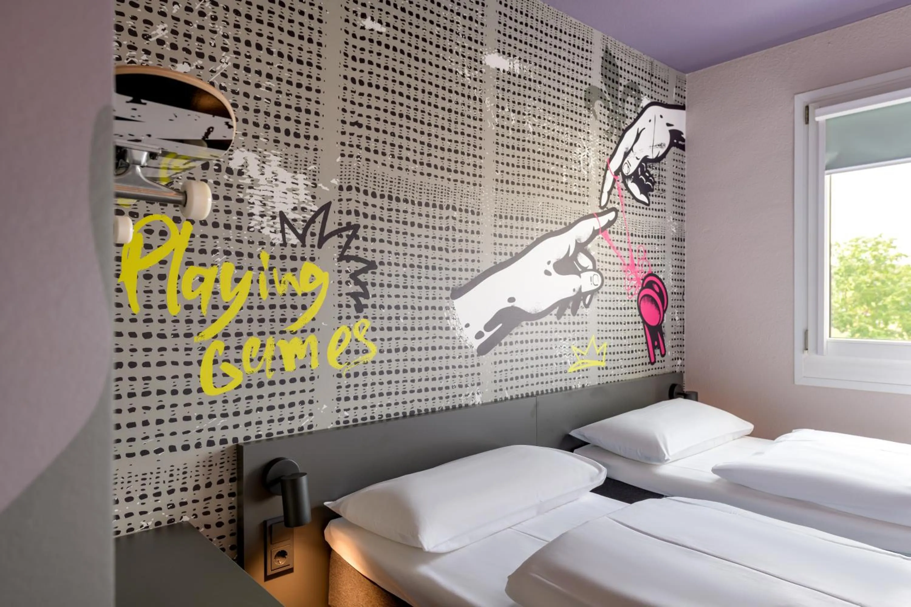 Bed in Felix Hotel Darmstadt