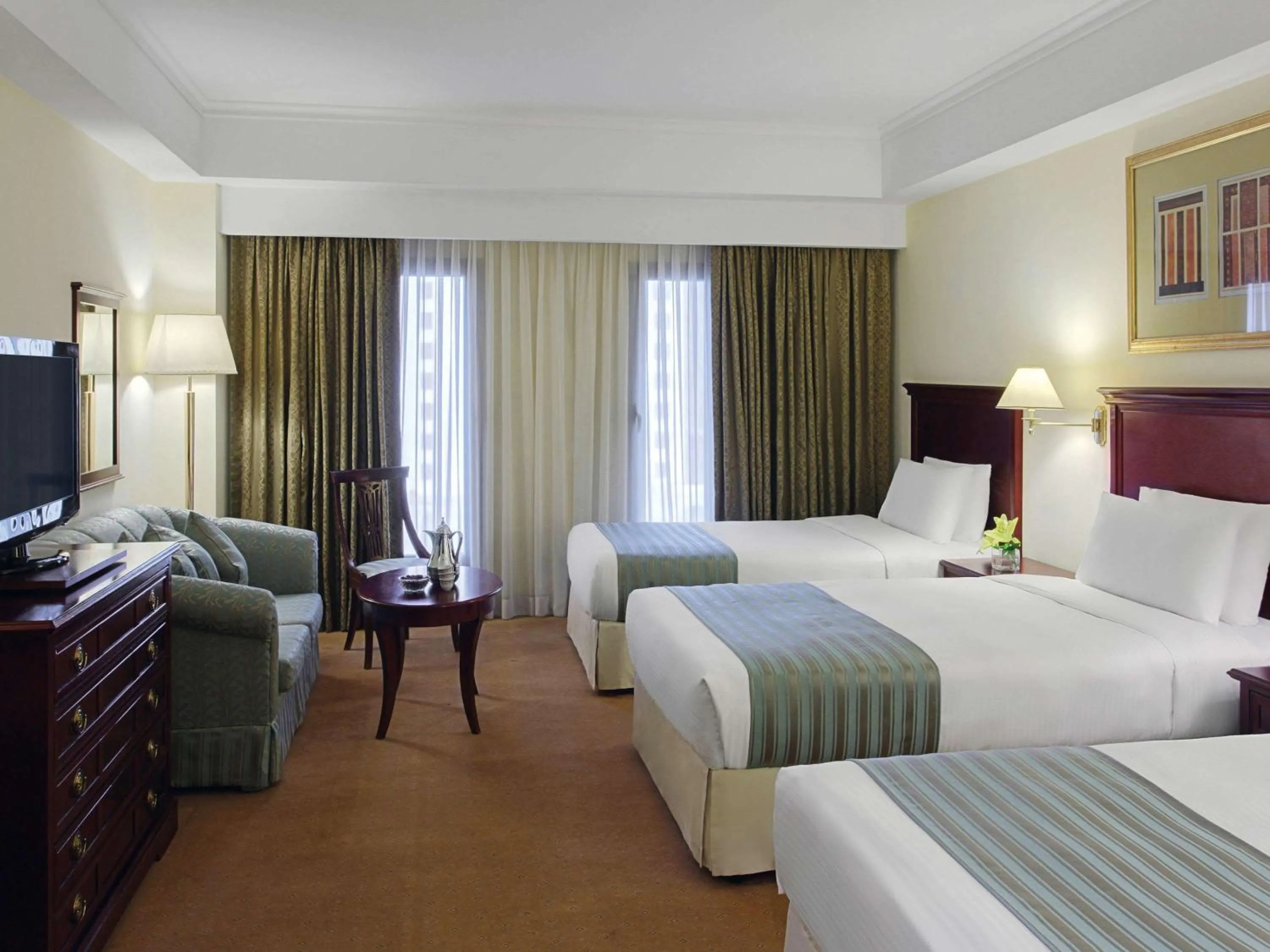 Photo of the whole room, Bed in New Madinah Hotel