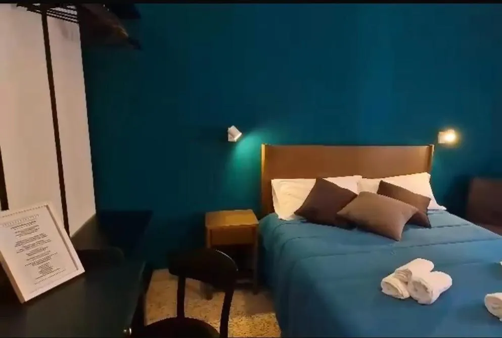 Quadruple Room with Private Bathroom in Rooms hub Portarotese