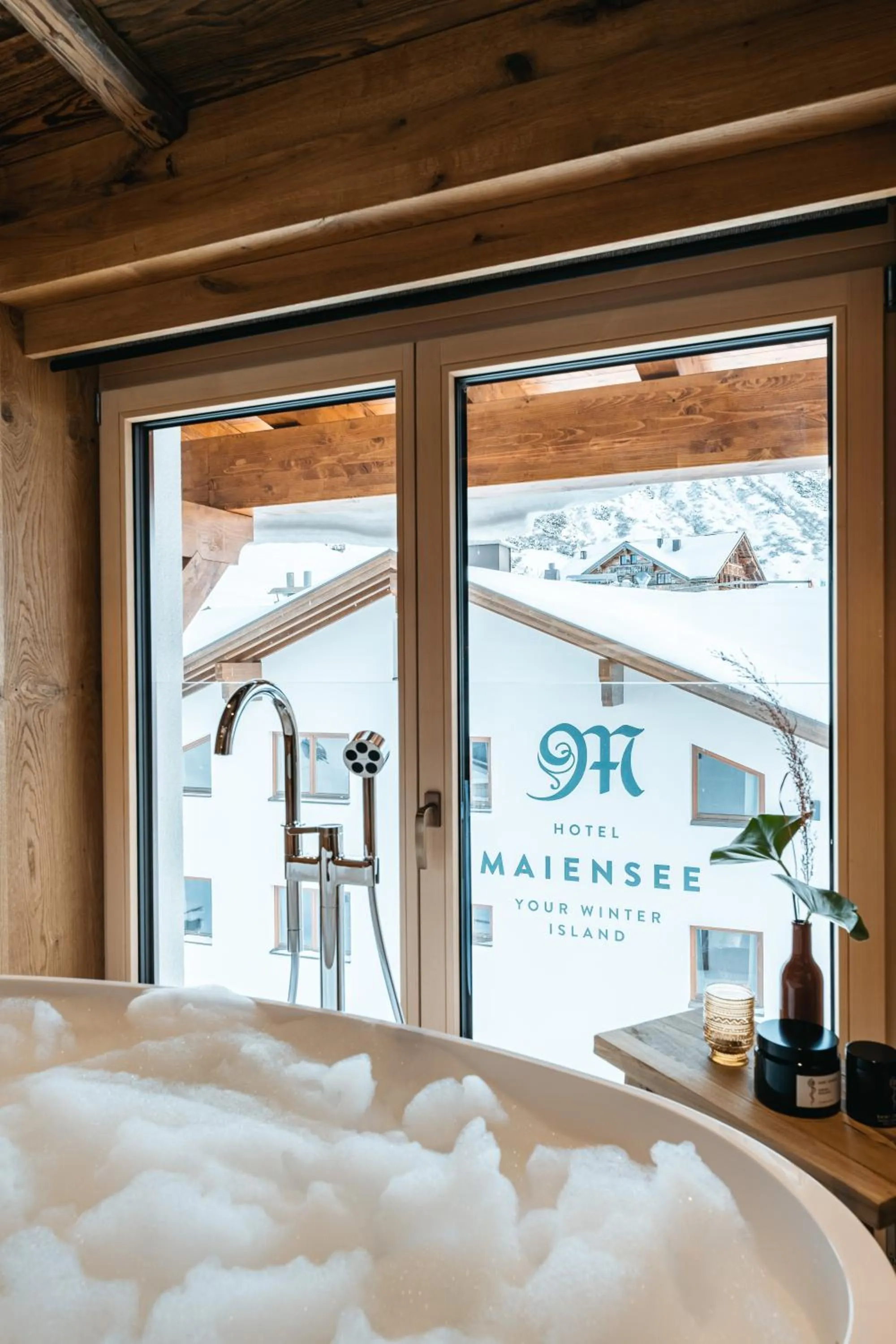 Bathroom, Bed in Hotel Maiensee