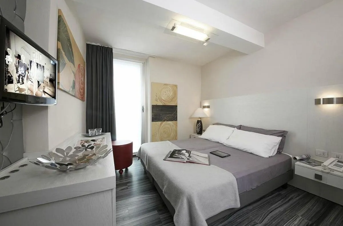 Bed in Happy Hotel Atelier Gardone Riviera Centro & Spa