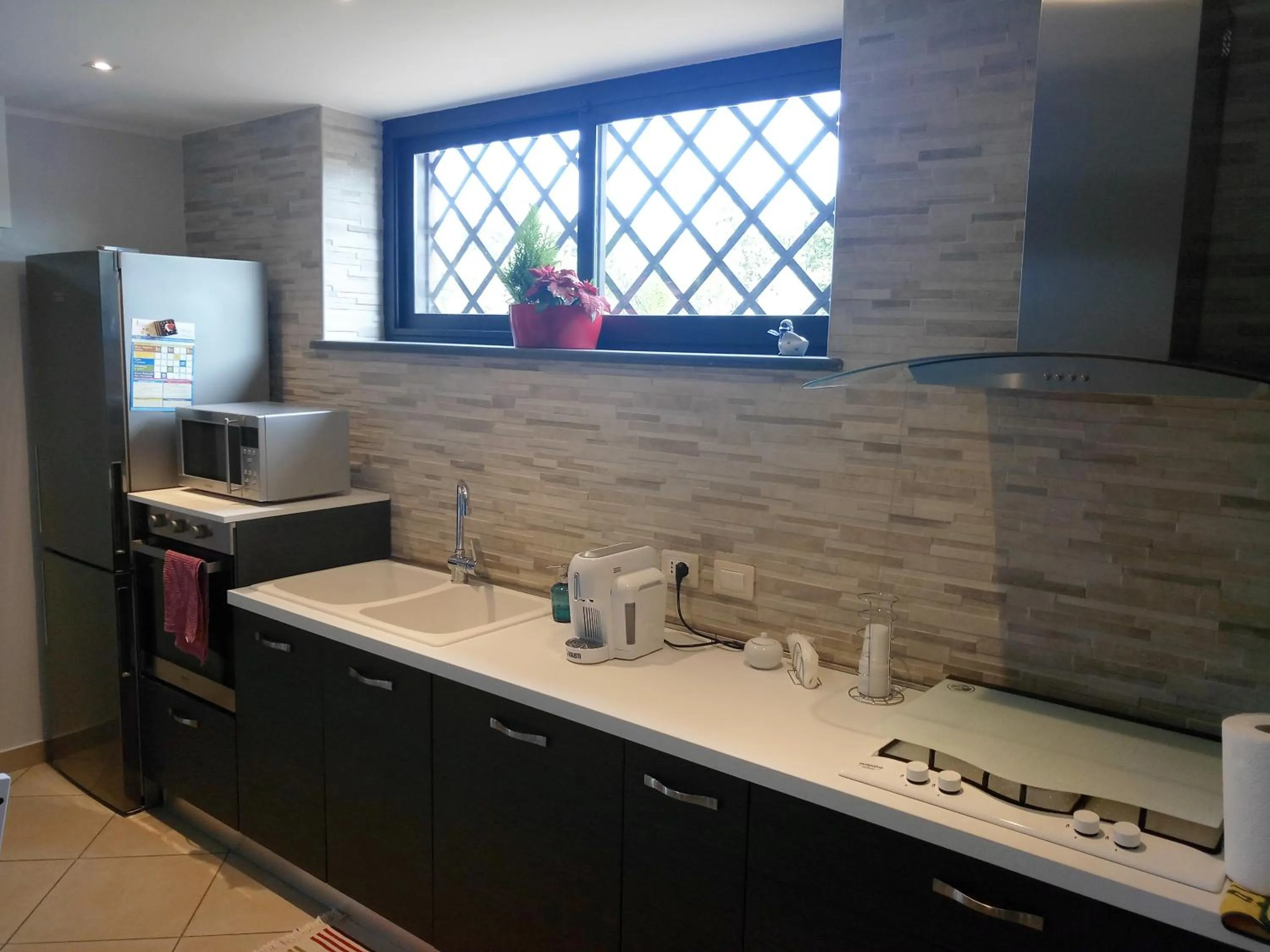 Communal kitchen in Villa Feluchia Tra Il Mare E Il Vulcano