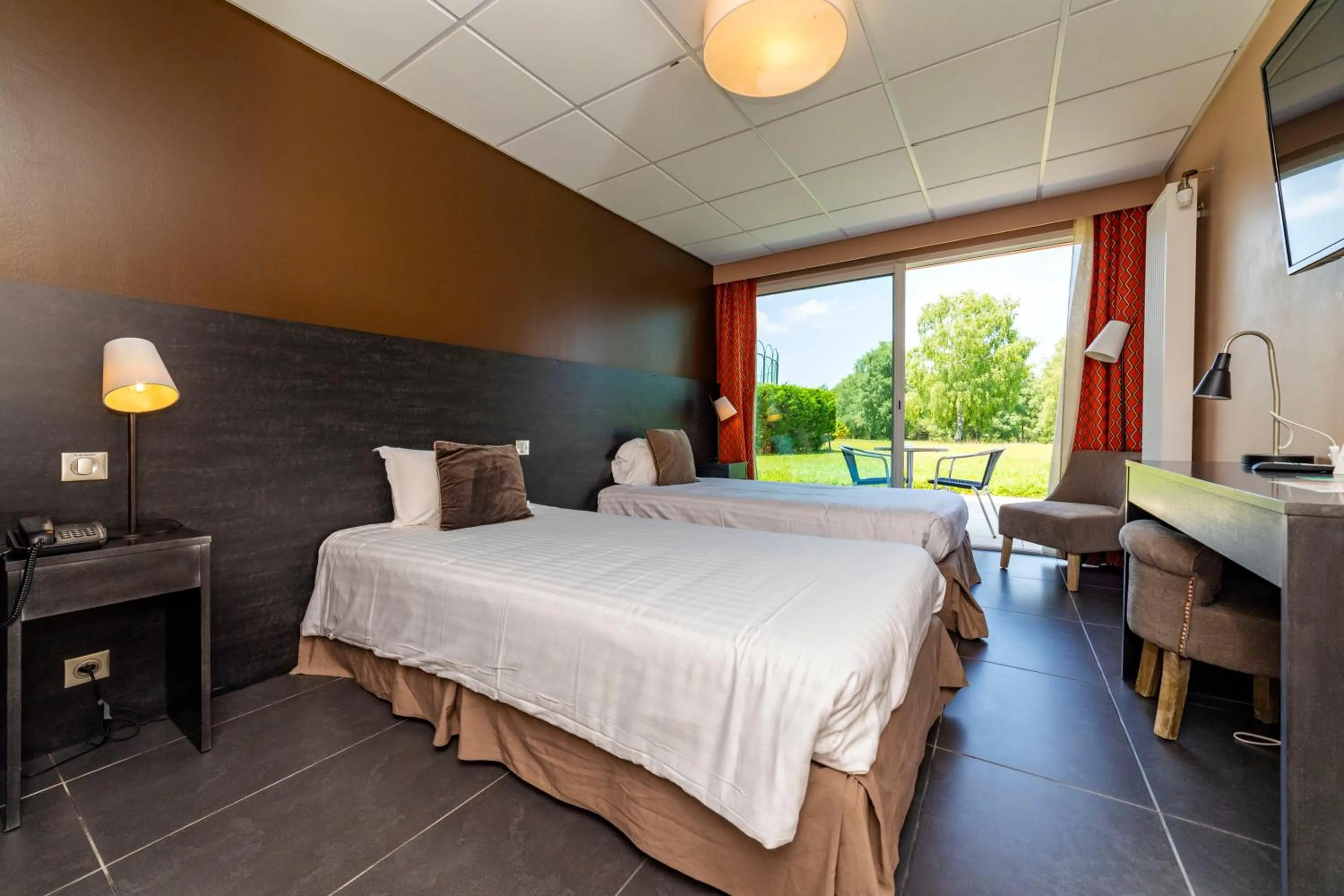 Bed in Hôtel du Casino de Capvern