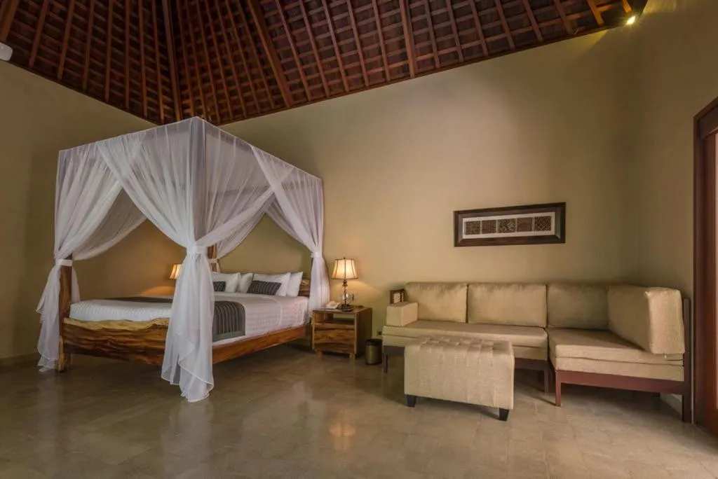 Living room, Bed in ILA Villa Ubud