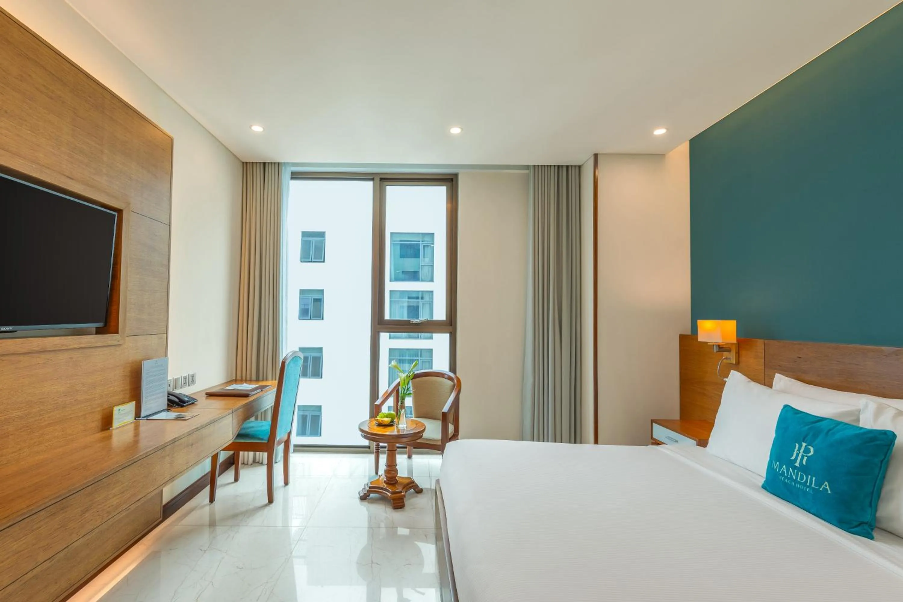 TV and multimedia, Bed in Mandila Beach Hotel Danang