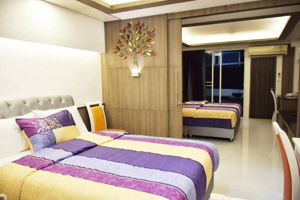 Property building, Bed in Family Suite Room Pratunam