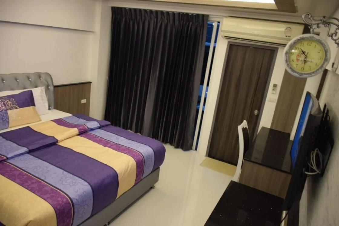 Bed in Family Suite Room Pratunam