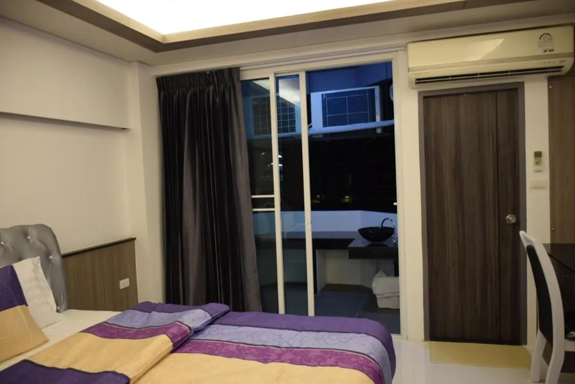 Bed in Family Suite Room Pratunam