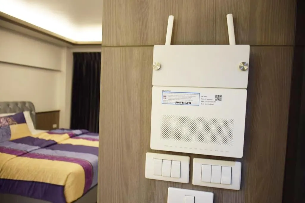 Property building, Bed in Family Suite Room Pratunam