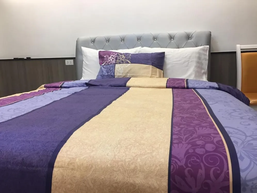 Bed in Family Suite Room Pratunam