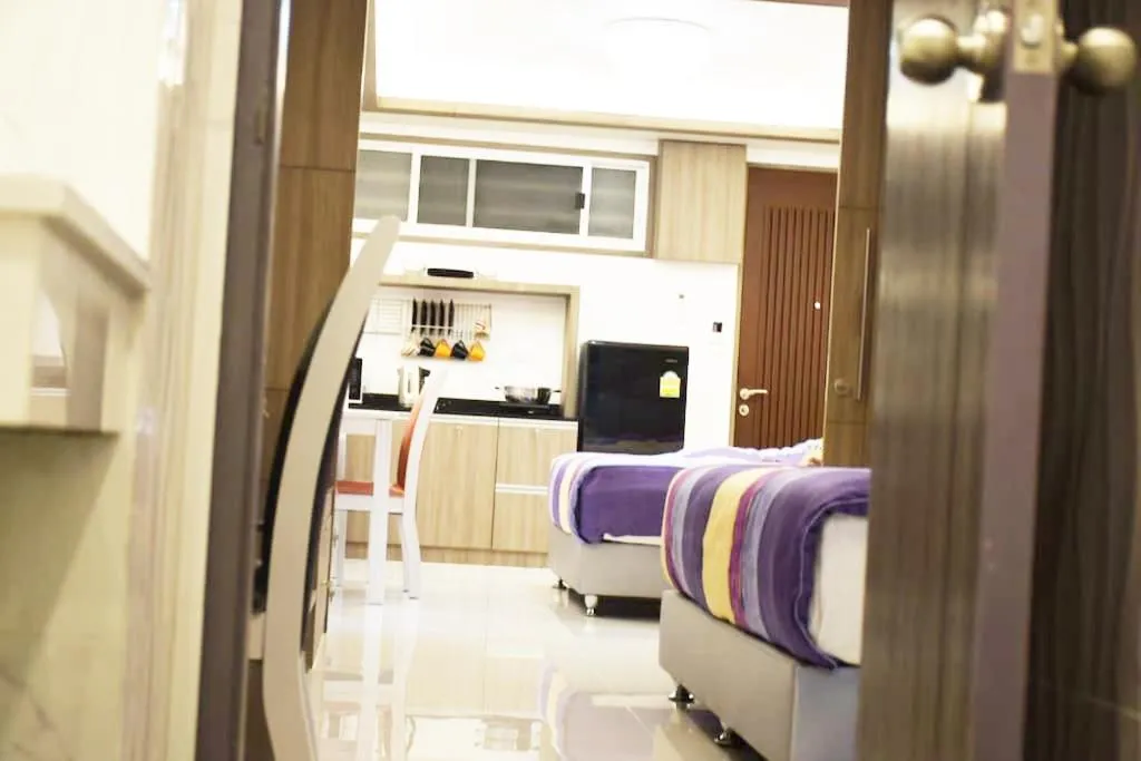 Property building, Bed in Family Suite Room Pratunam