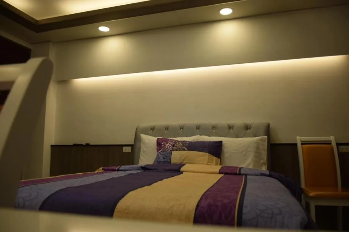 Bed in Family Suite Room Pratunam