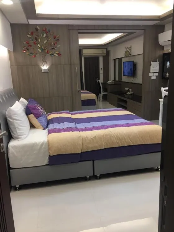 Bed in Family Suite Room Pratunam