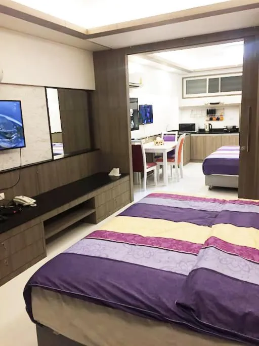 Property building, Bed in Family Suite Room Pratunam
