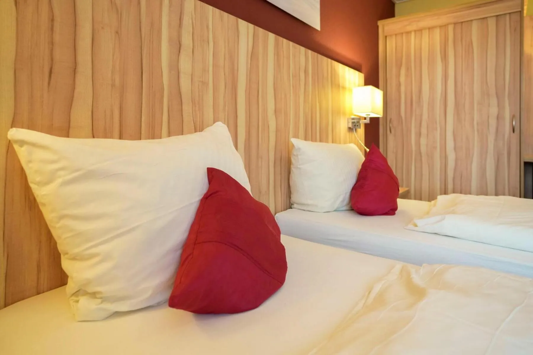 Bed in Hotel Weinhaus Kreuter