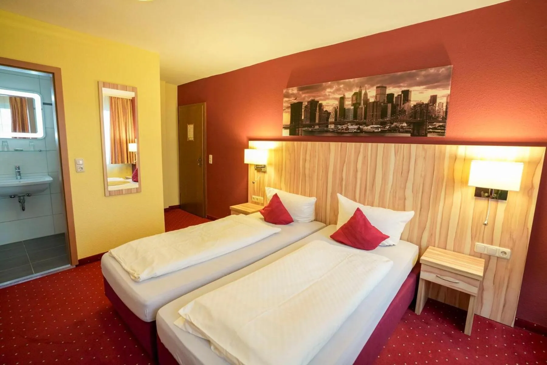 Bed in Hotel Weinhaus Kreuter