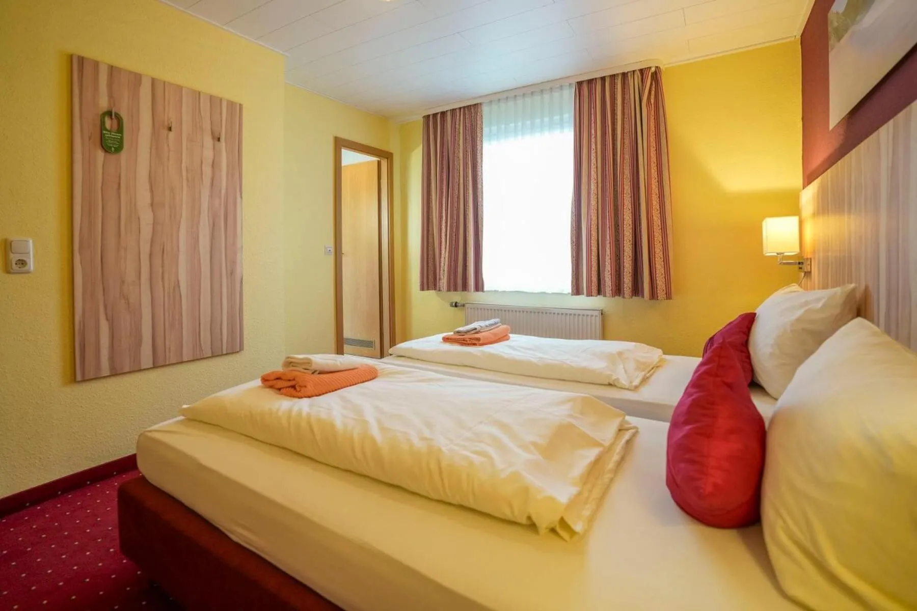 Bed in Hotel Weinhaus Kreuter