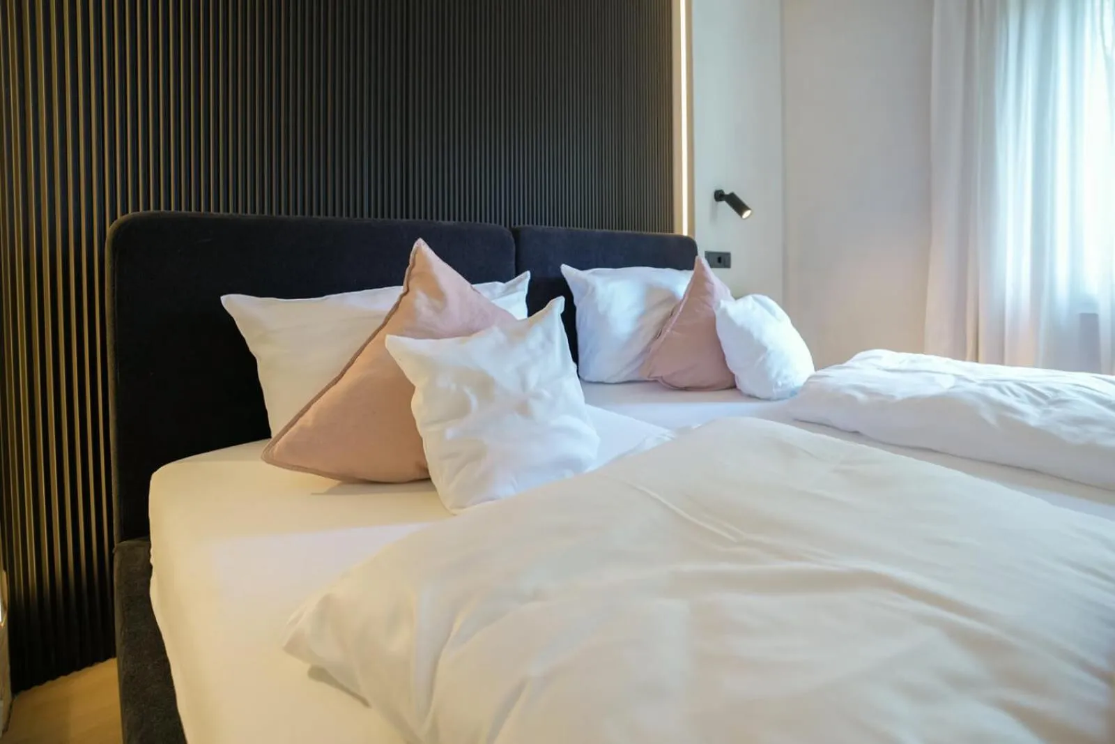 Bed in Hotel Weinhaus Kreuter