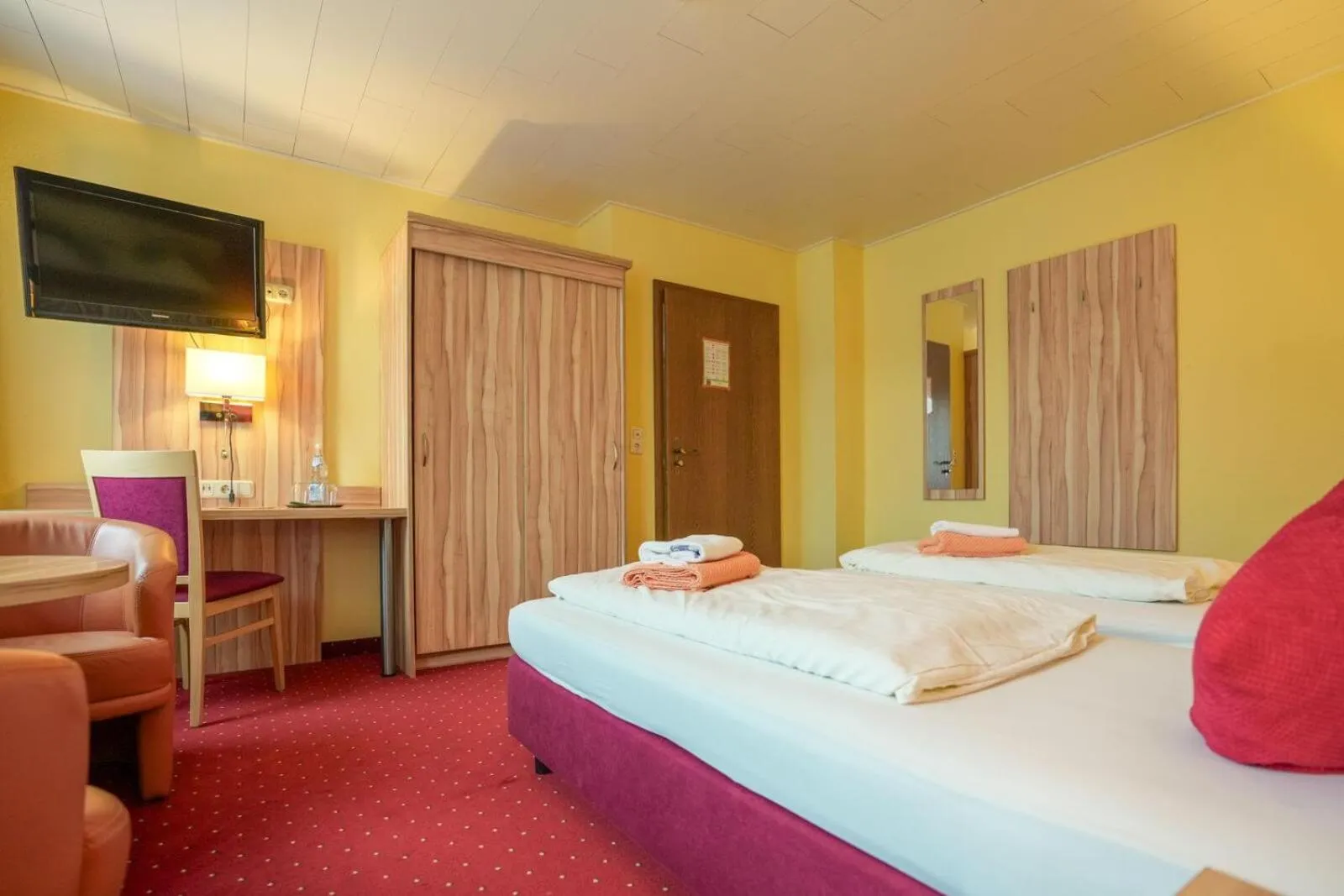 Bed in Hotel Weinhaus Kreuter