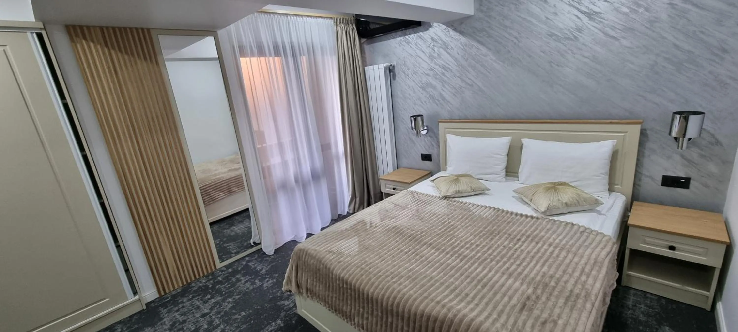 Bed in Hotel Rapsodia City Center